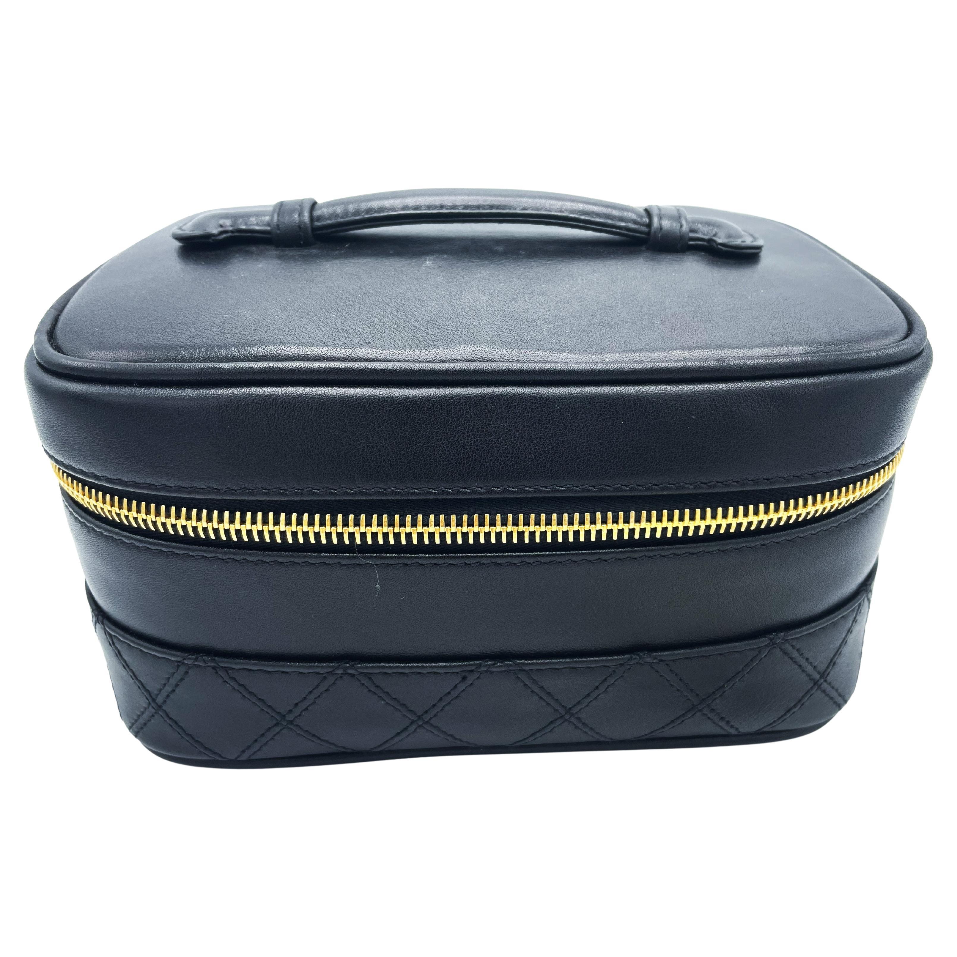 CHANEL BLACK QUILTED LAMBSKIIN VANITY CASE, classic interlocking CC logo, 1990s For Sale