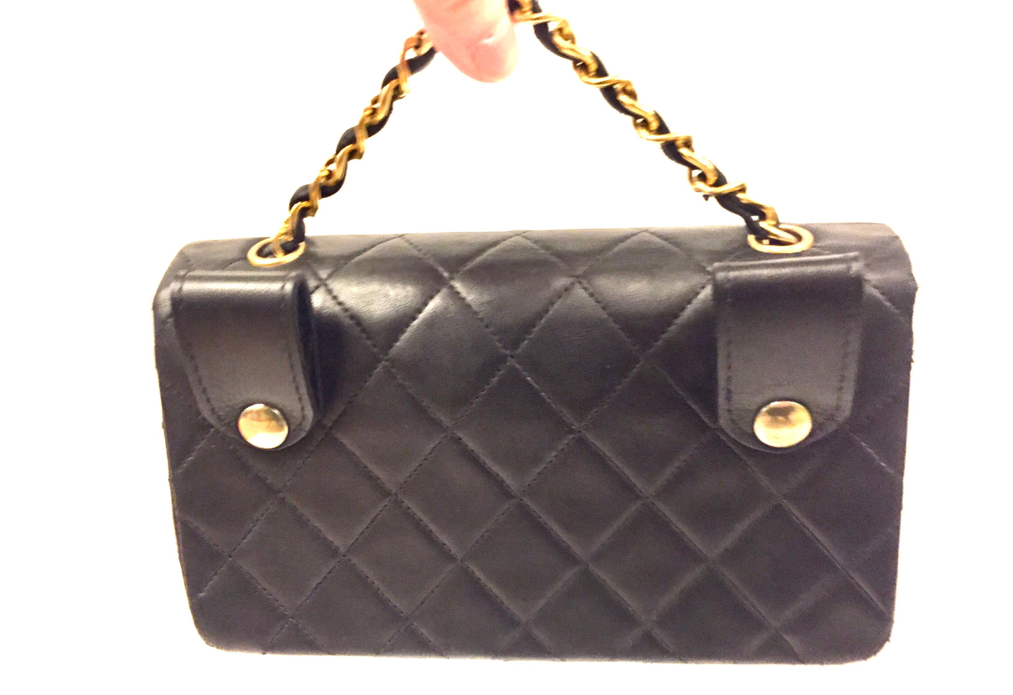 Black Chanel black quilted lambskin belt bag/handbag/clutch