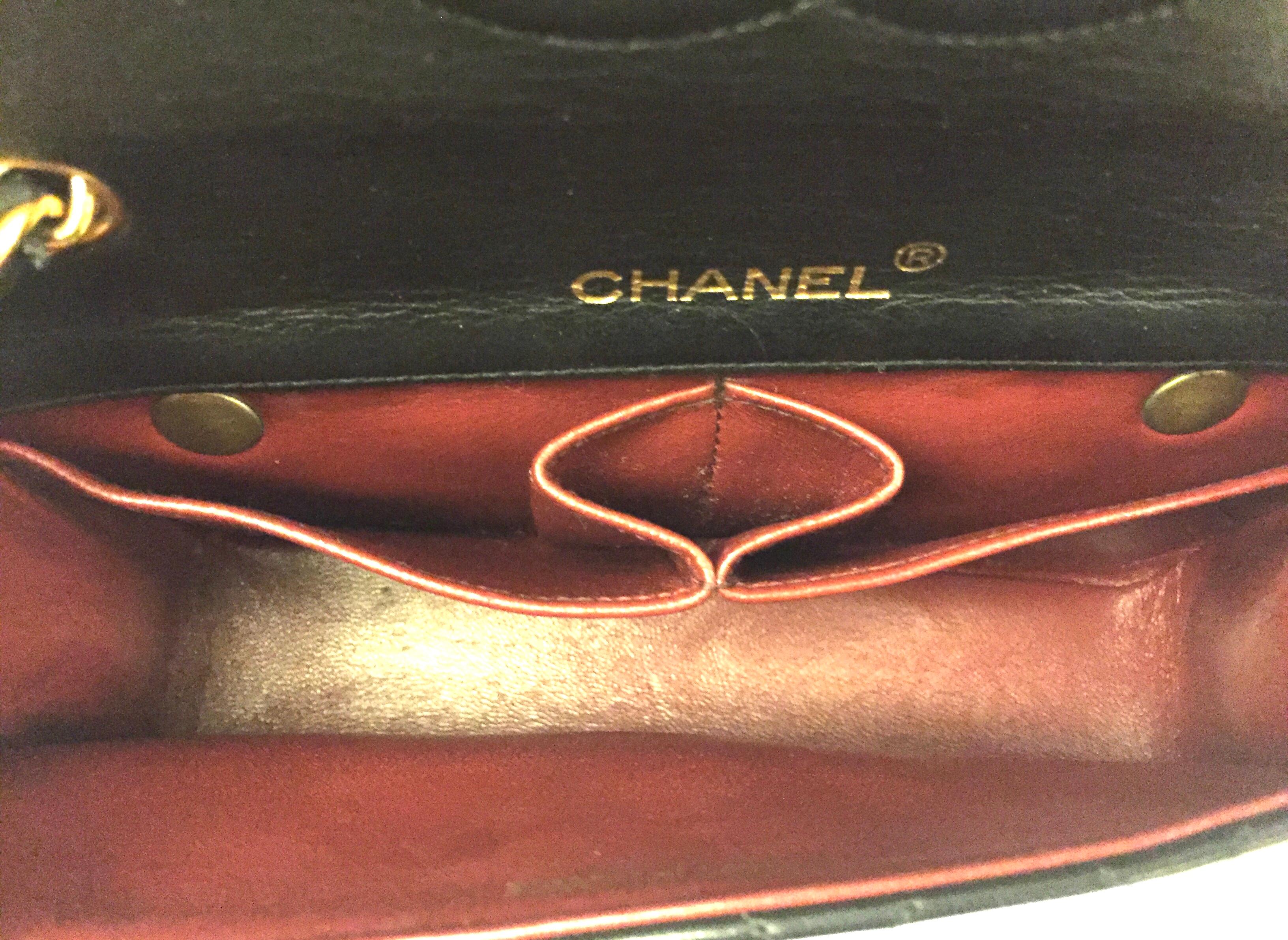 Women's Chanel black quilted lambskin belt bag/handbag/clutch