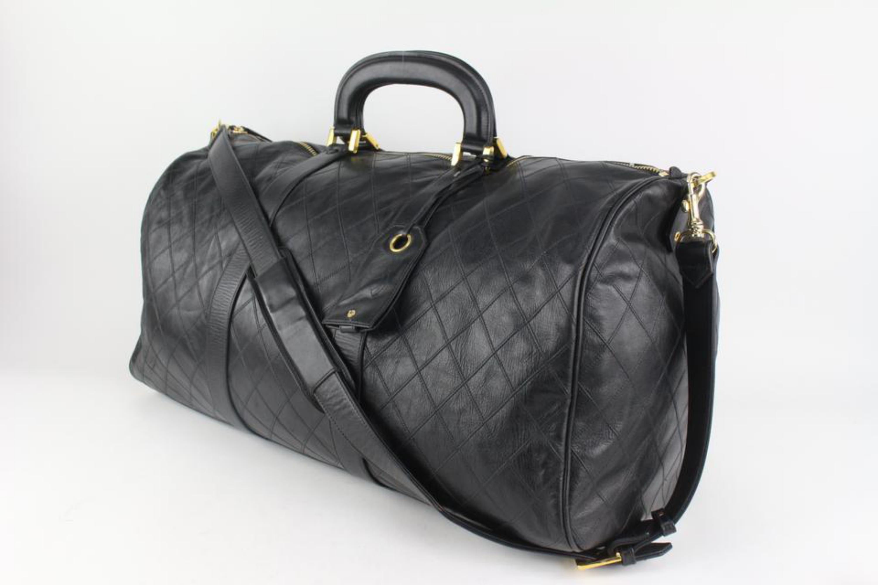 Chanel Black Quilted Lambskin Boston Duffle with Strap 1116c43
Date Code/Serial Number: 0842443
Made In: Italy
Measurements: Length:  23