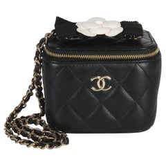 Chanel Black Quilted Lambskin Camelia Bow Chain Mini Vanity Case
