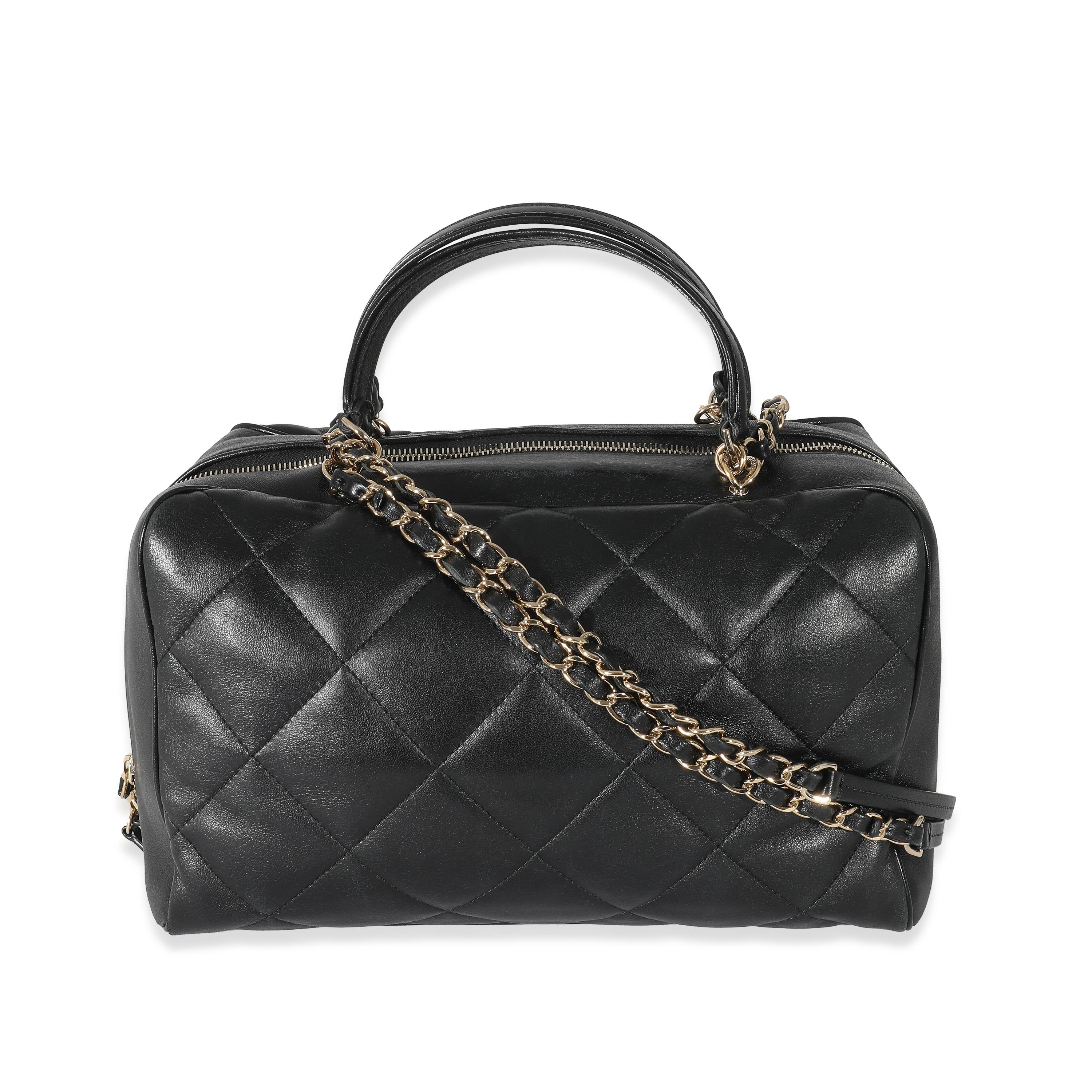 Listing Title: Chanel Black Quilted Lambskin CC Chain Zip Bowling Bag
SKU: 134137
Condition: Pre-owned 
Handbag Condition: Excellent
Condition Comments: Item is in excellent condition and displays light signs of wear. Exterior heavy corner scuffing