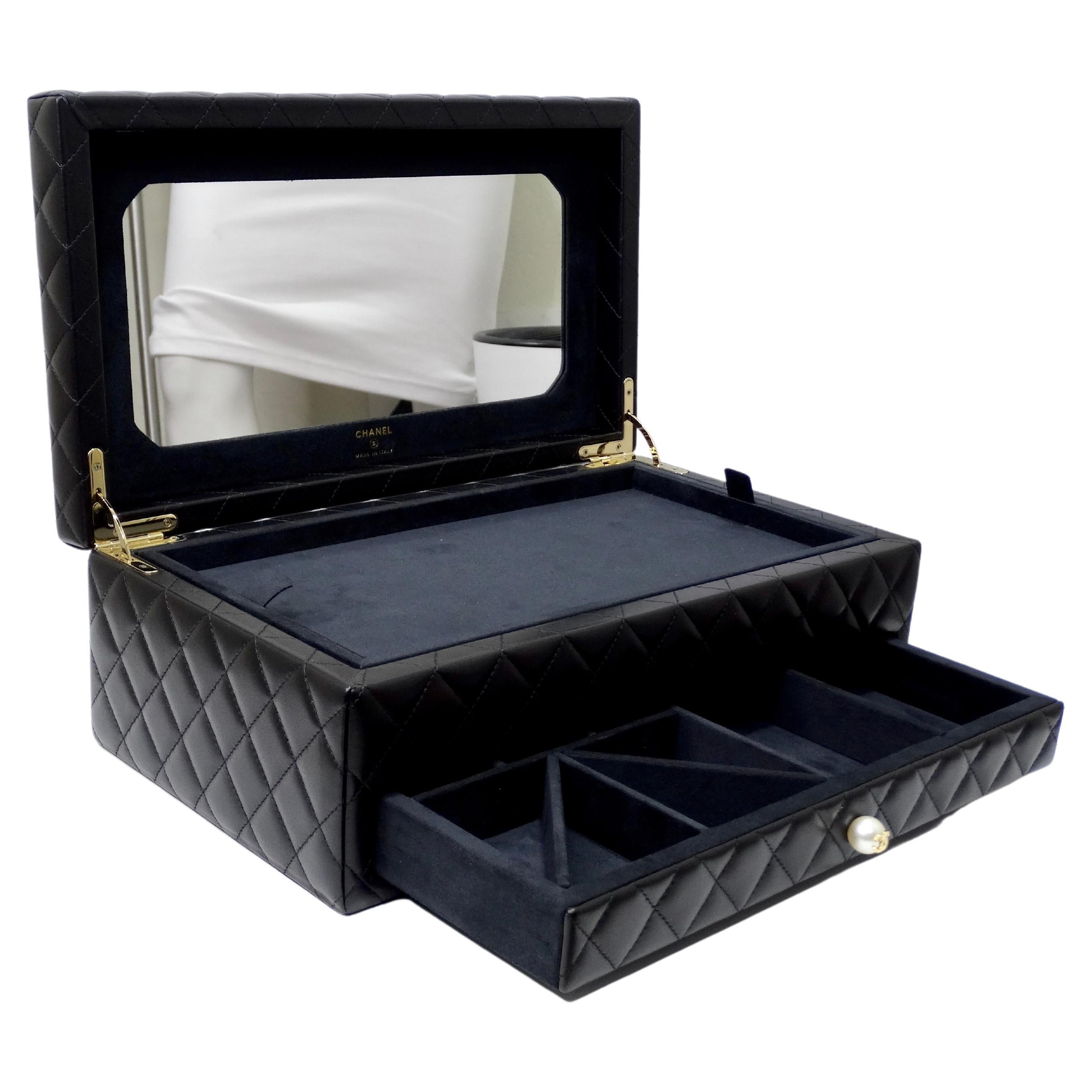 The most coveted Chanel piece you could get your hands on! Get ready in the best way with this Chanel jewelry box made of the best materials. This incredible piece of artwork is from a 2010 collection and is meant to hold your jewelry, makeup, or