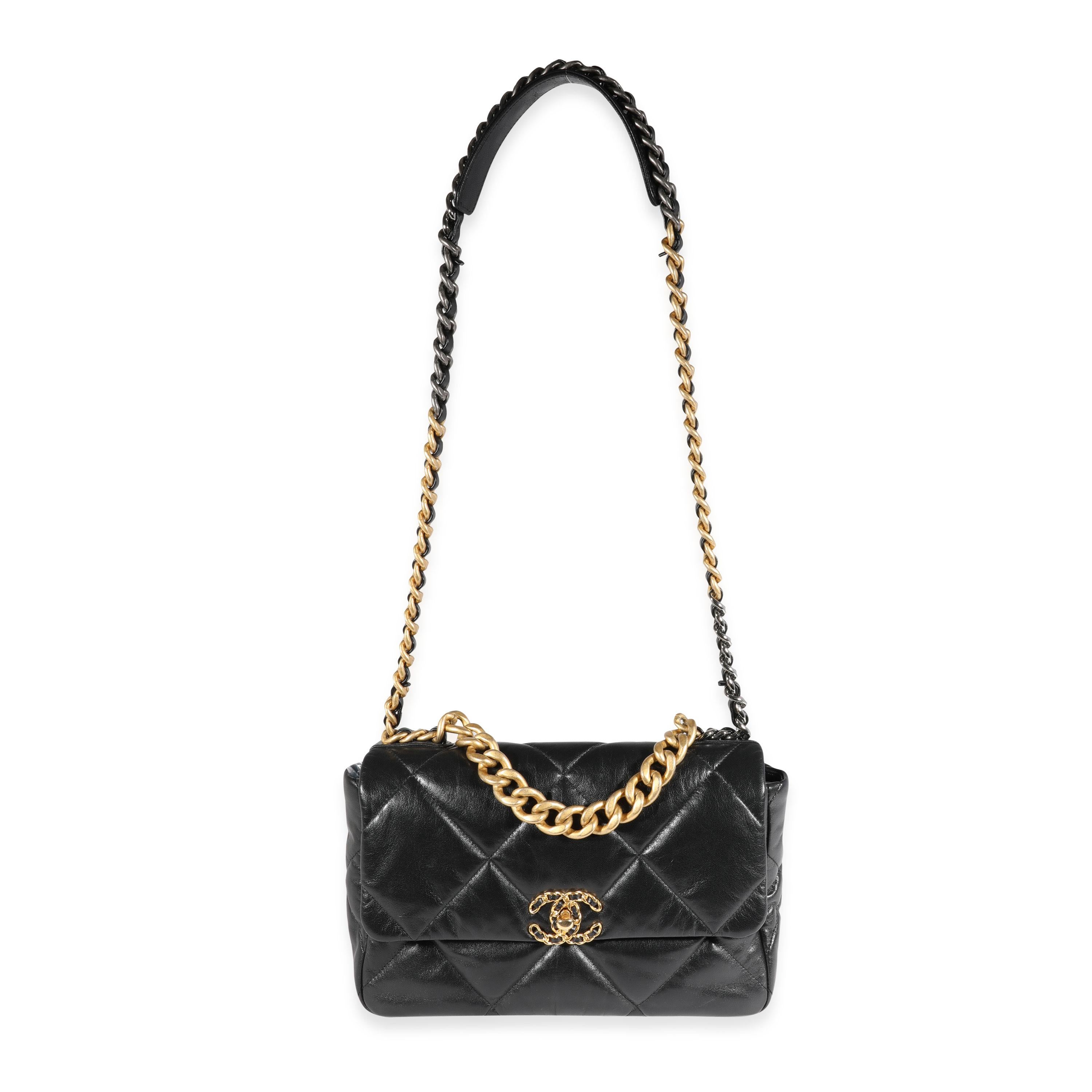 Listing Title: Chanel Black Quilted Lambskin Chanel 19 Large Flap Bag
SKU: 121606
MSRP: 6300.00
Condition: Pre-owned 
Handbag Condition: Excellent
Condition Comments: Excellent Condition. Plastic on some hardware. Scuffing under flap. No other