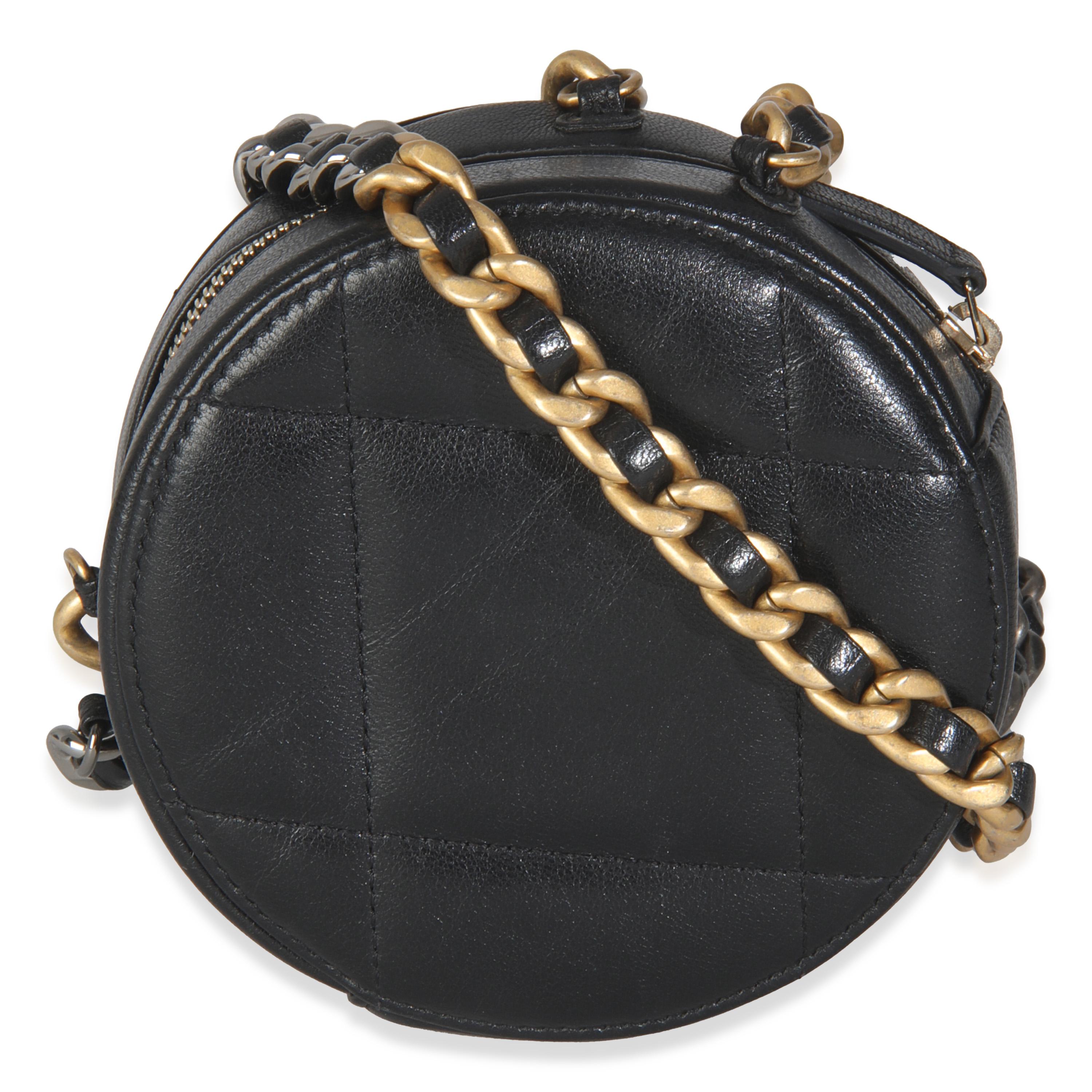 Listing Title: Chanel Black Quilted Lambskin Chanel 19 Round Clutch With Chain
SKU: 145989
Condition: Pre-owned 
Handbag Condition: Excellent
Condition Comments: Item is in excellent condition and displays light signs of wear. Light scratches along