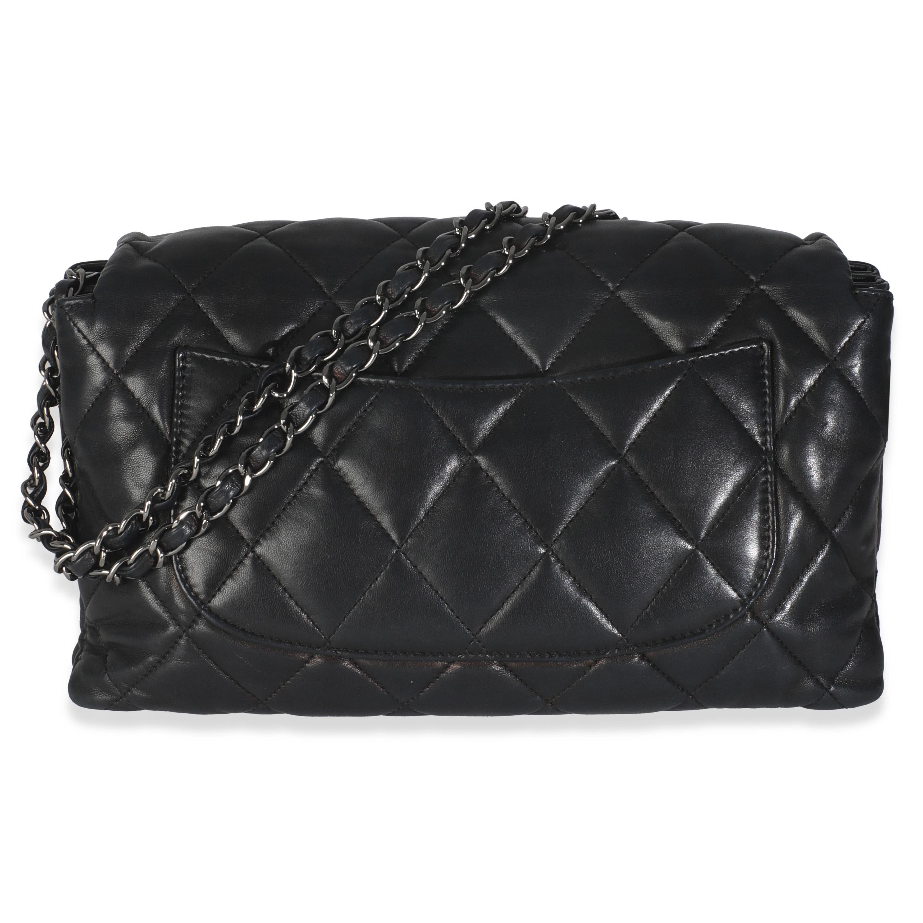 Listing Title: Chanel Black Quilted Lambskin Chanel 3 Accordion Flap Bag
SKU: 145965
Condition: Pre-owned 
Condition Description: A timeless classic that never goes out of style, the flap bag from Chanel dates back to 1955 and has seen a number of