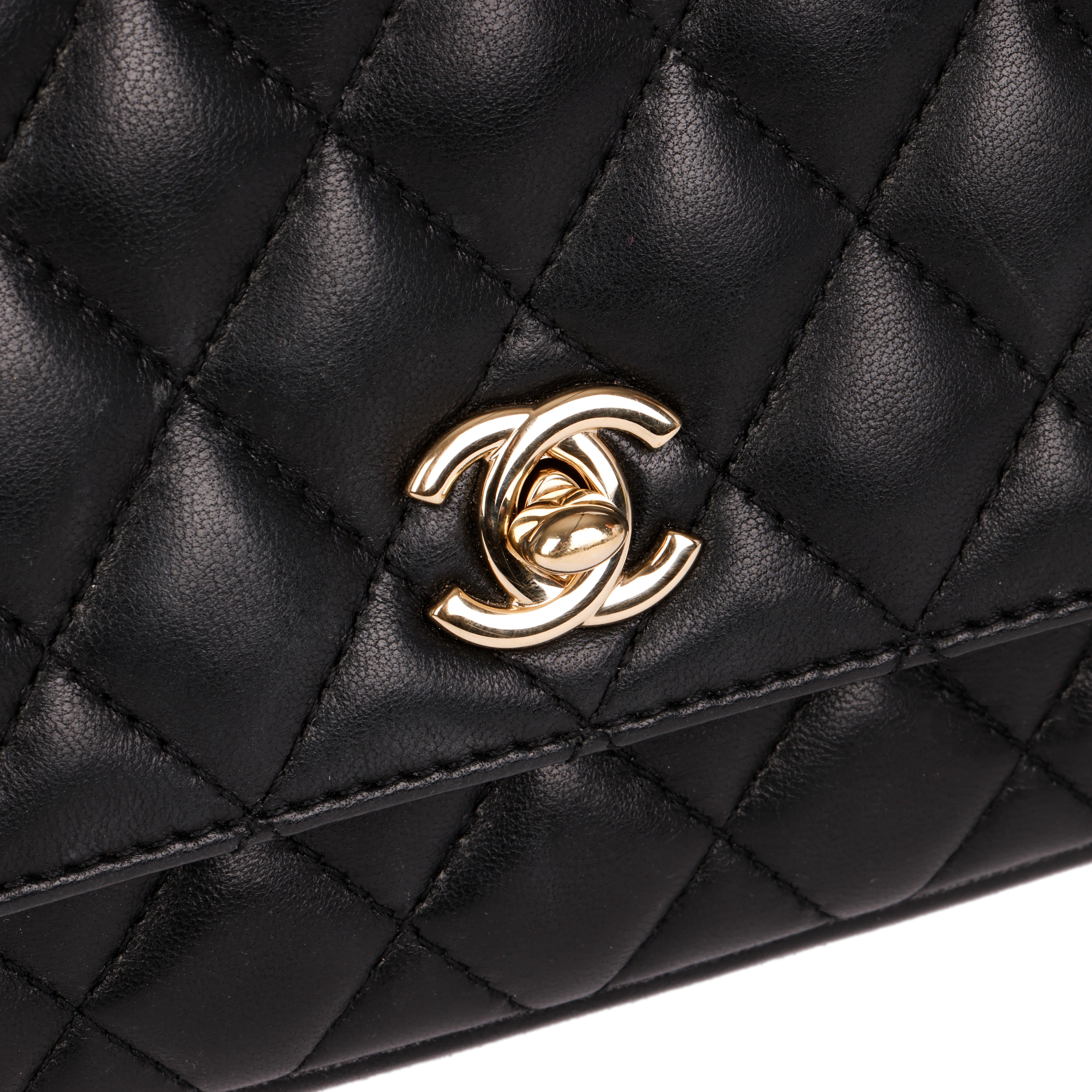 CHANEL
Black Quilted Lambskin Classic Twin Flap Bag Side Pack

Xupes Reference: HB4012
Serial Number: 27507521
Age (Circa): 2019
Accompanied By: Chanel Dust Bag, Authenticity Card
Authenticity Details: Authenticity Card, Serial Sticker (Made in