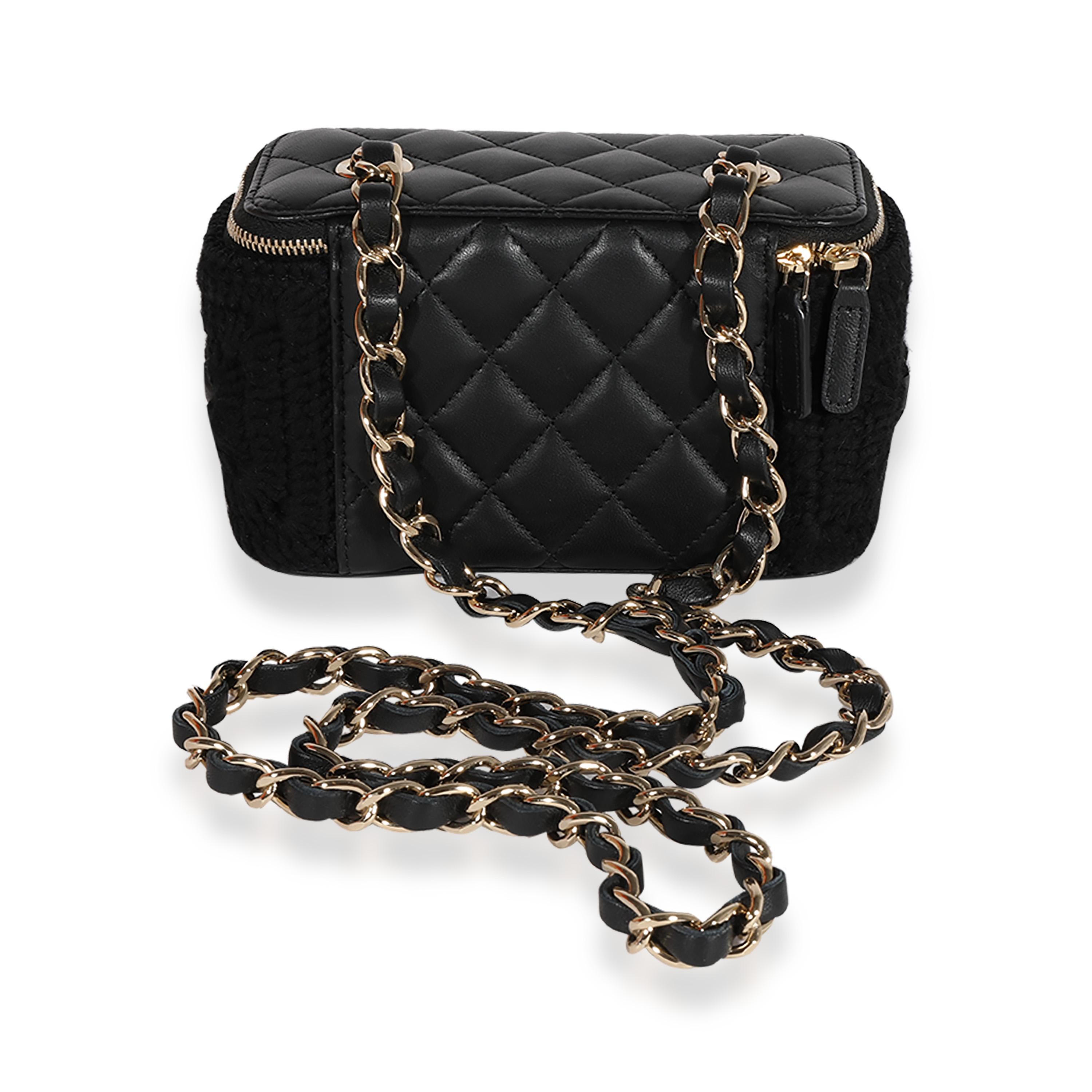 Listing Title: Chanel Black Quilted Lambskin & Crochet Vanity Case with Chain
SKU: 123090
MSRP: 2750.00
Condition: Pre-owned 
Handbag Condition: Very Good
Condition Comments: Very Good Condition. Light scuffing and marks at exterior. Faint