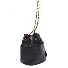 Chanel Black Quilted Lambskin Gold Toned "CC" Drawstring Bucket Shoulder Bag.