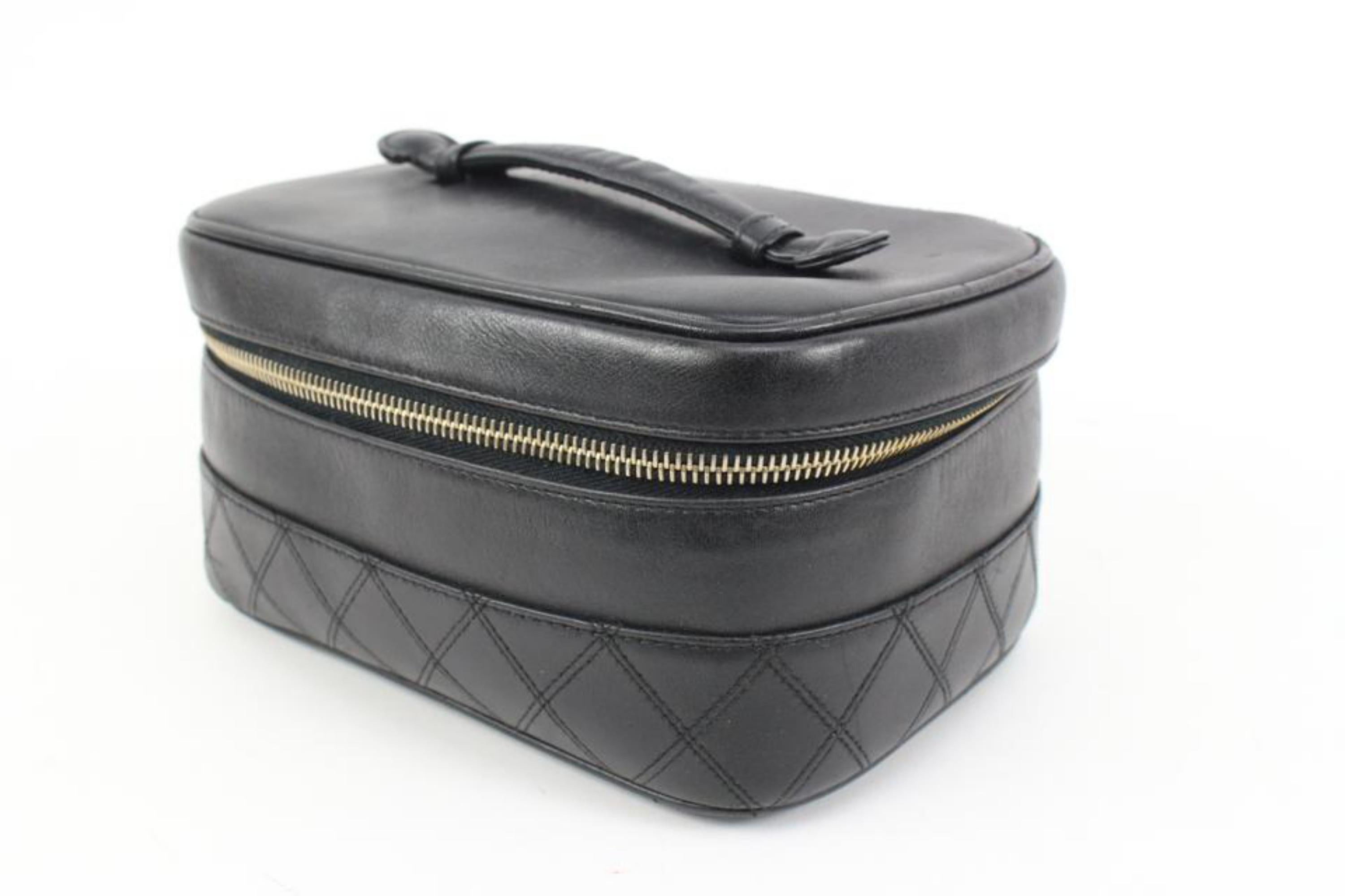 Chanel Black Quilted Lambskin Horizontal Vanity Case 20ck324s
Date Code/Serial Number: 30x887
Made In: Italy
Measurements: Length:  7.5