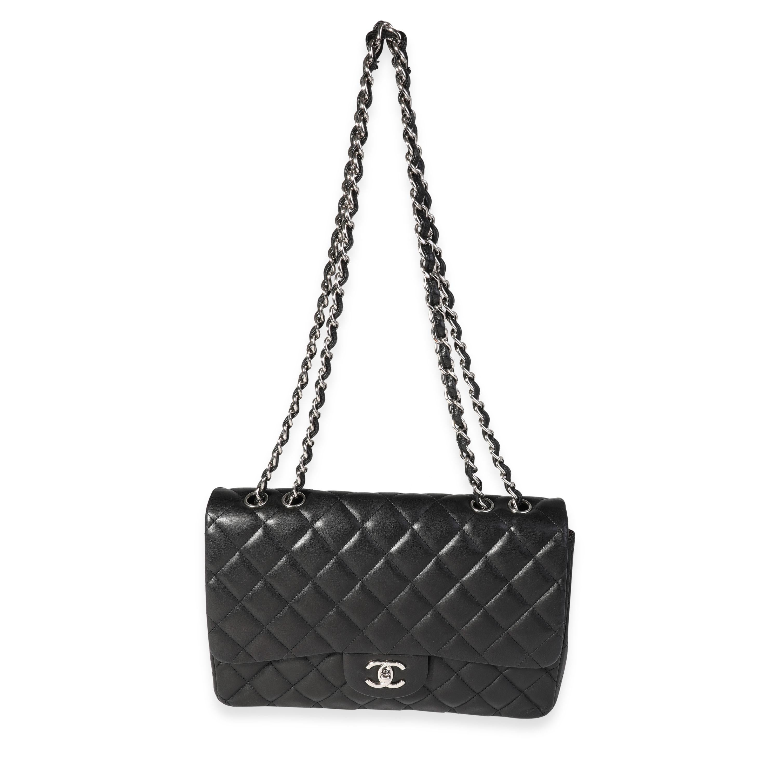 Listing Title: Chanel Black Quilted Lambskin Jumbo Classic Single Flap Bag
SKU: 121323
MSRP: 9500.00
Condition: Pre-owned 
Handbag Condition: Good
Condition Comments: Good Condition. Scuffing to corners and throughout exterior. Light scratching to