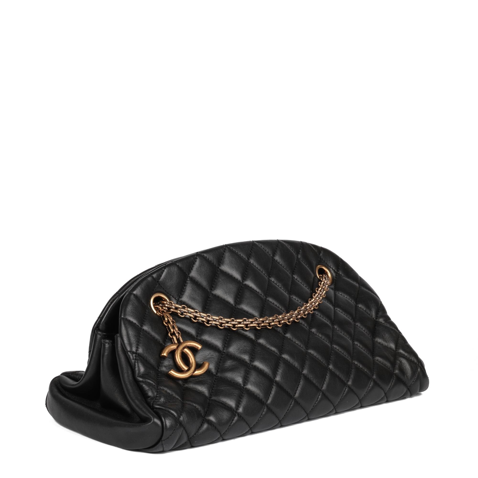 CHANEL
Black Quilted Lambskin Just Mademoiselle Bowling Bag

Xupes Reference: HB5064
Serial Number: 14827562
Age (Circa): 2010
Accompanied By: Chanel Dust Bag, Authenticity Card
Authenticity Details: Authenticity Card, Serial Sticker (Made in