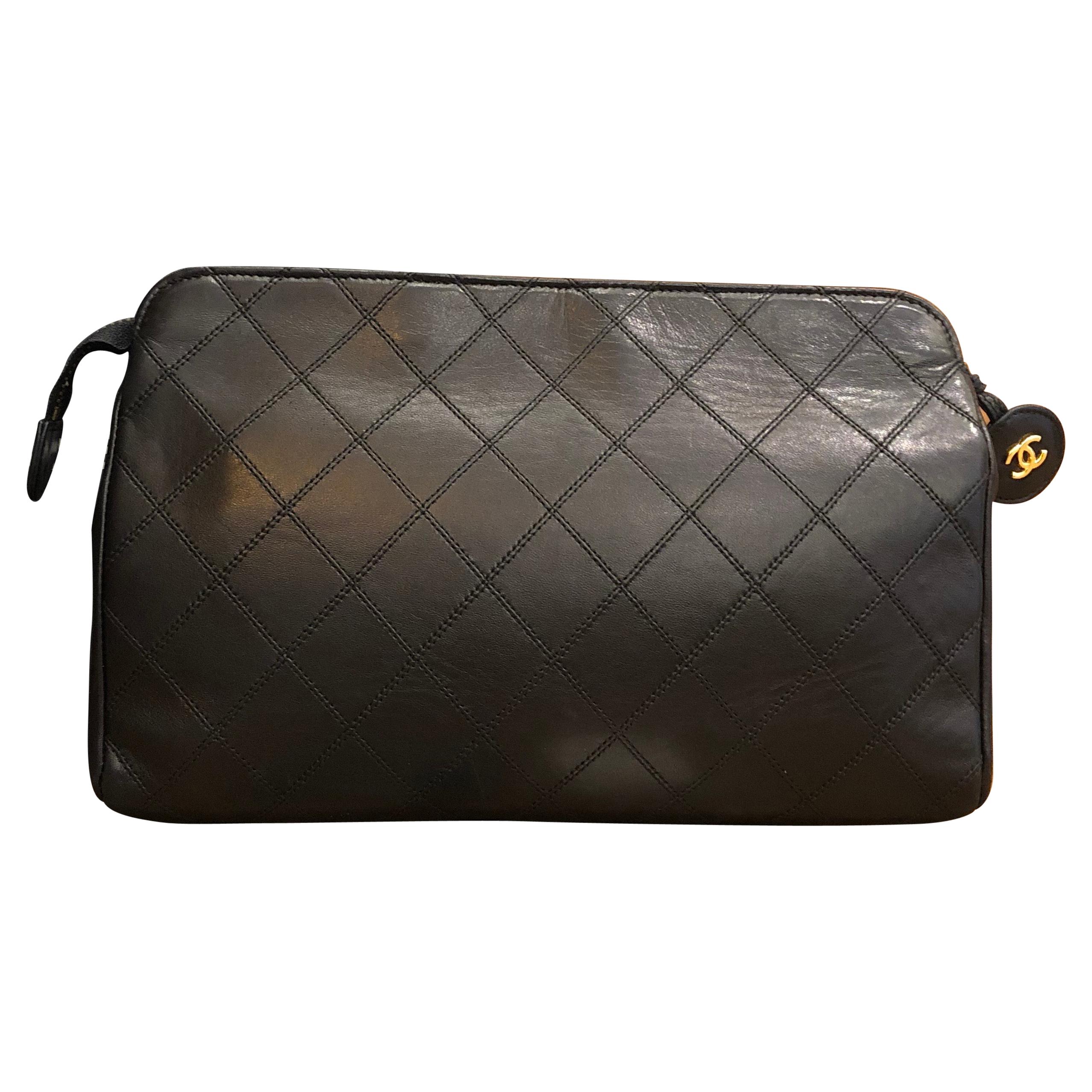 CHANEL Black Quilted Lambskin Leather Clutch Bag
