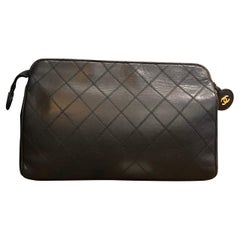 CHANEL Black Quilted Lambskin Leather Clutch Bag