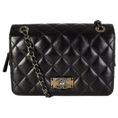 CHANEL black quilted lambskin leather DAY TRIP FLAP Shoulder Bag