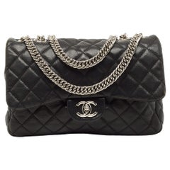 Borsa Chanel nera trapuntata in pelle di agnello Jumbo Classic con patta singola