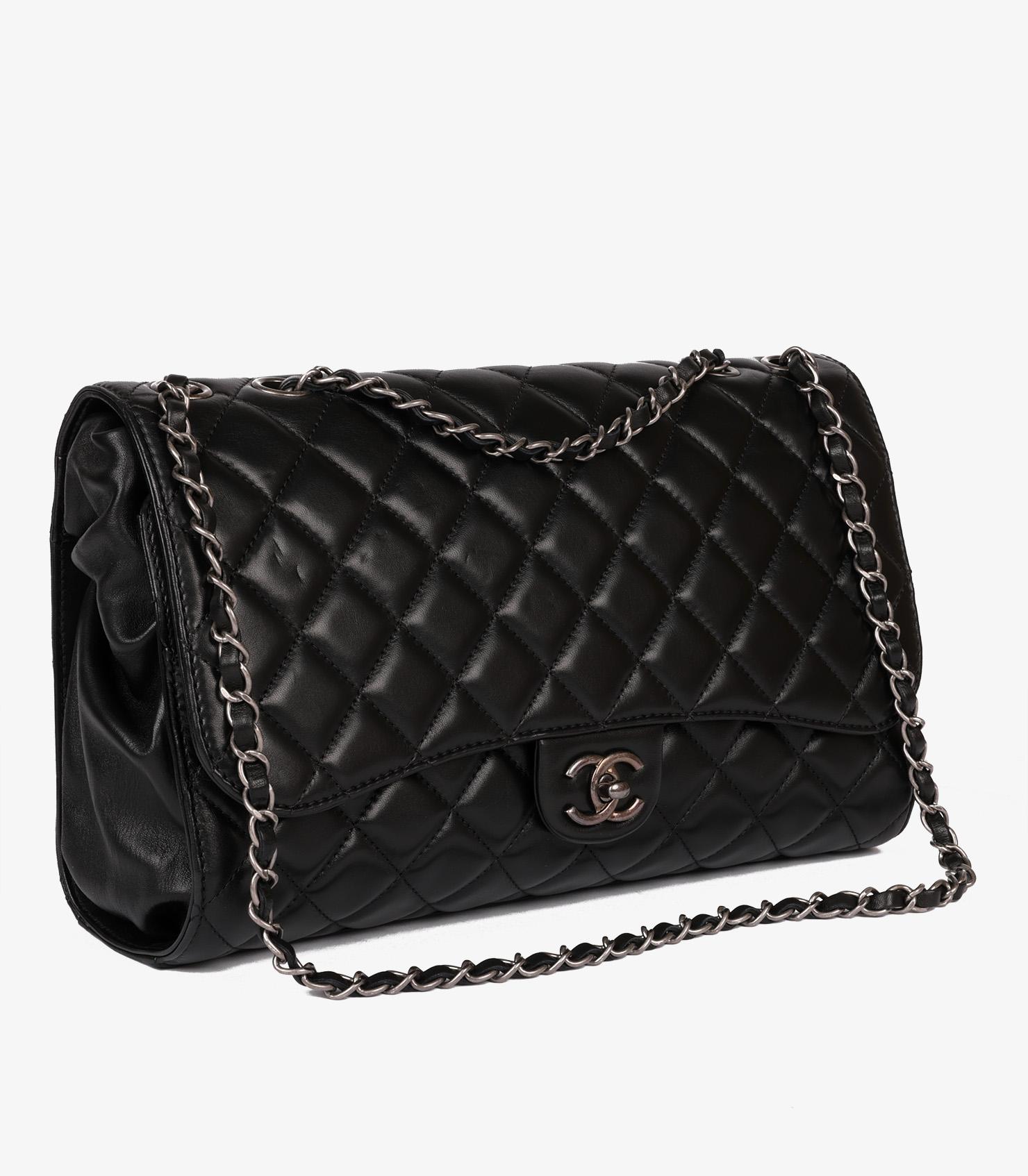 Chanel Black Quilted Lambskin Leather Jumbo Drawstring Classic Single Flap Bag In Excellent Condition For Sale In Bishop's Stortford, Hertfordshire