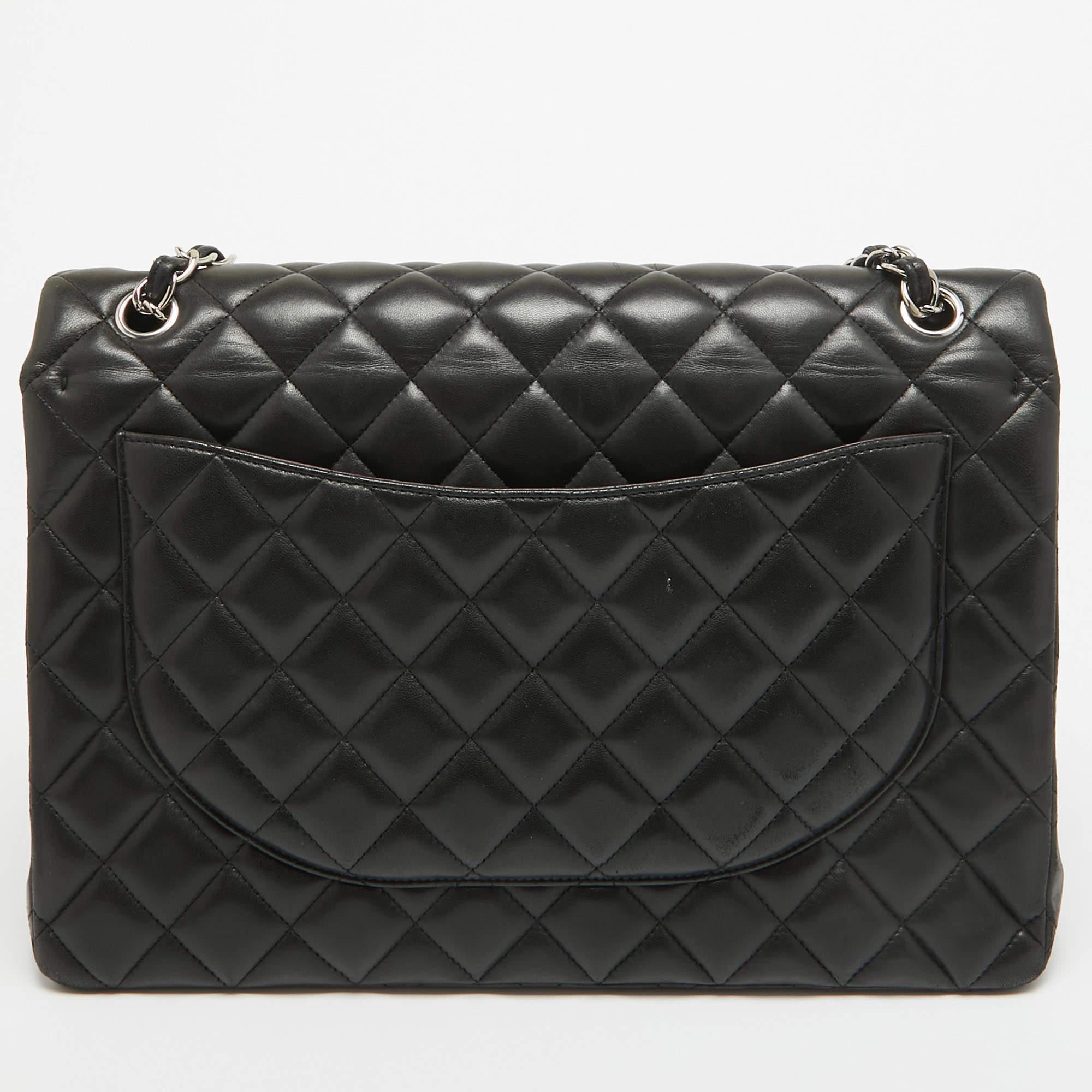 This Chanel black bag is an example of the brand's fine designs that are skillfully crafted to project a classic charm. It is a functional creation with an elevating appeal.

Includes: Original Box, Info Booklet
