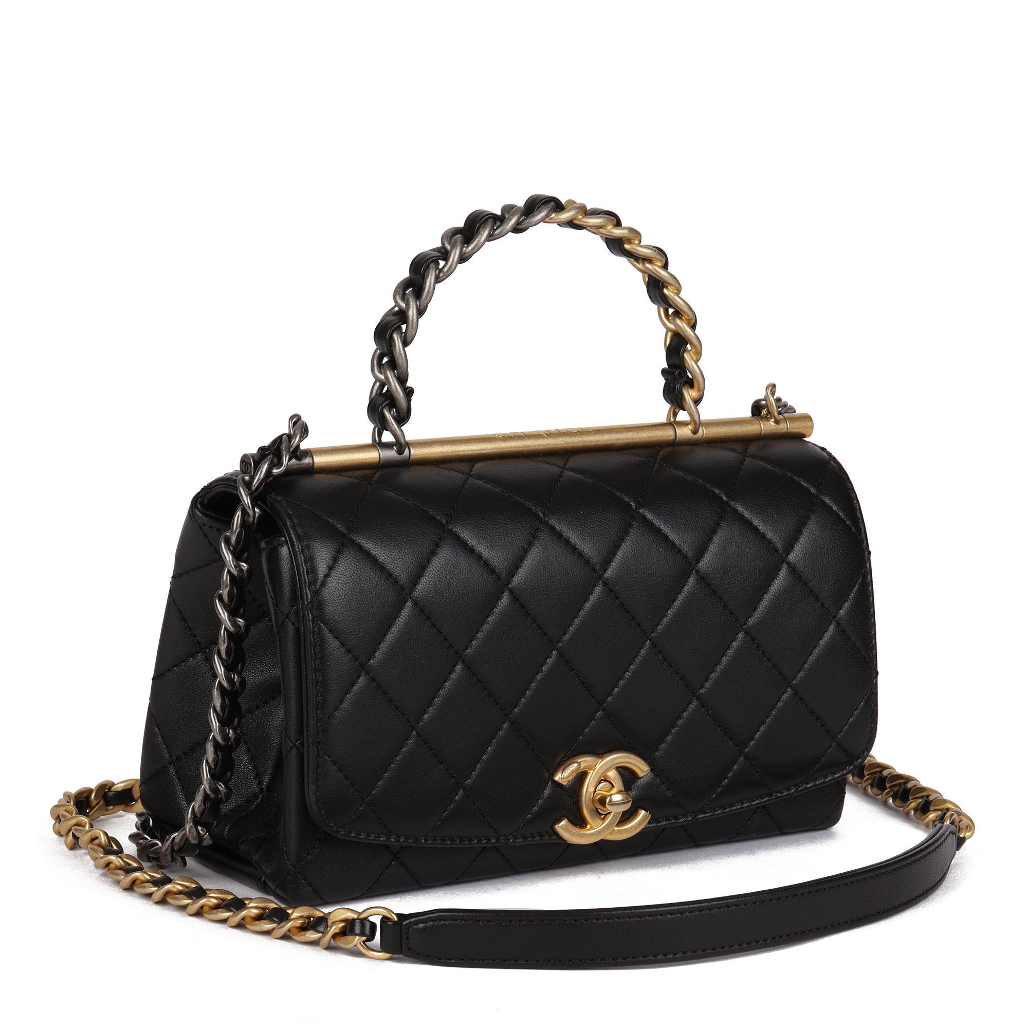 CHANEL
Black Quilted Lambskin Leather Small Classic Top Handle Flap Bag

Xupes Reference: HB4426
Serial Number: 29970067
Age (Circa): 2021
Accompanied By: Chanel Dust Bag, Authenticity Card
Authenticity Details: Authenticity Card, Serial Sticker