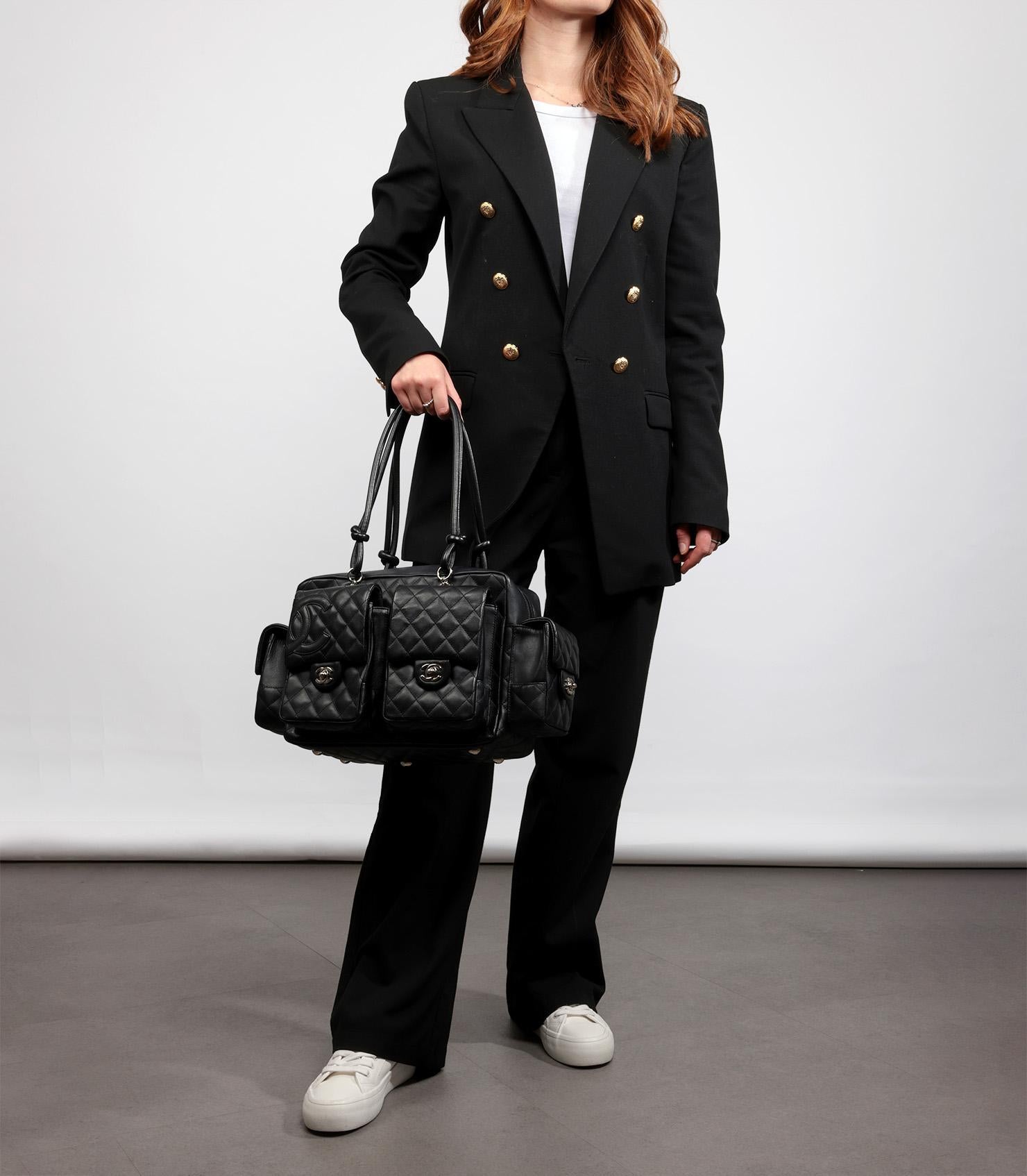 Chanel Black Quilted Lambskin Leather Vintage Cambon Reporter

Product Details
Xupes Ref: CB1384
Brand: Chanel
Model: Cambon Reporter
Type: Tote, Shoulder
Serial Number: 9400635
Age: 2004
Accompanied By: Chanel Dust Bag, Box, Original