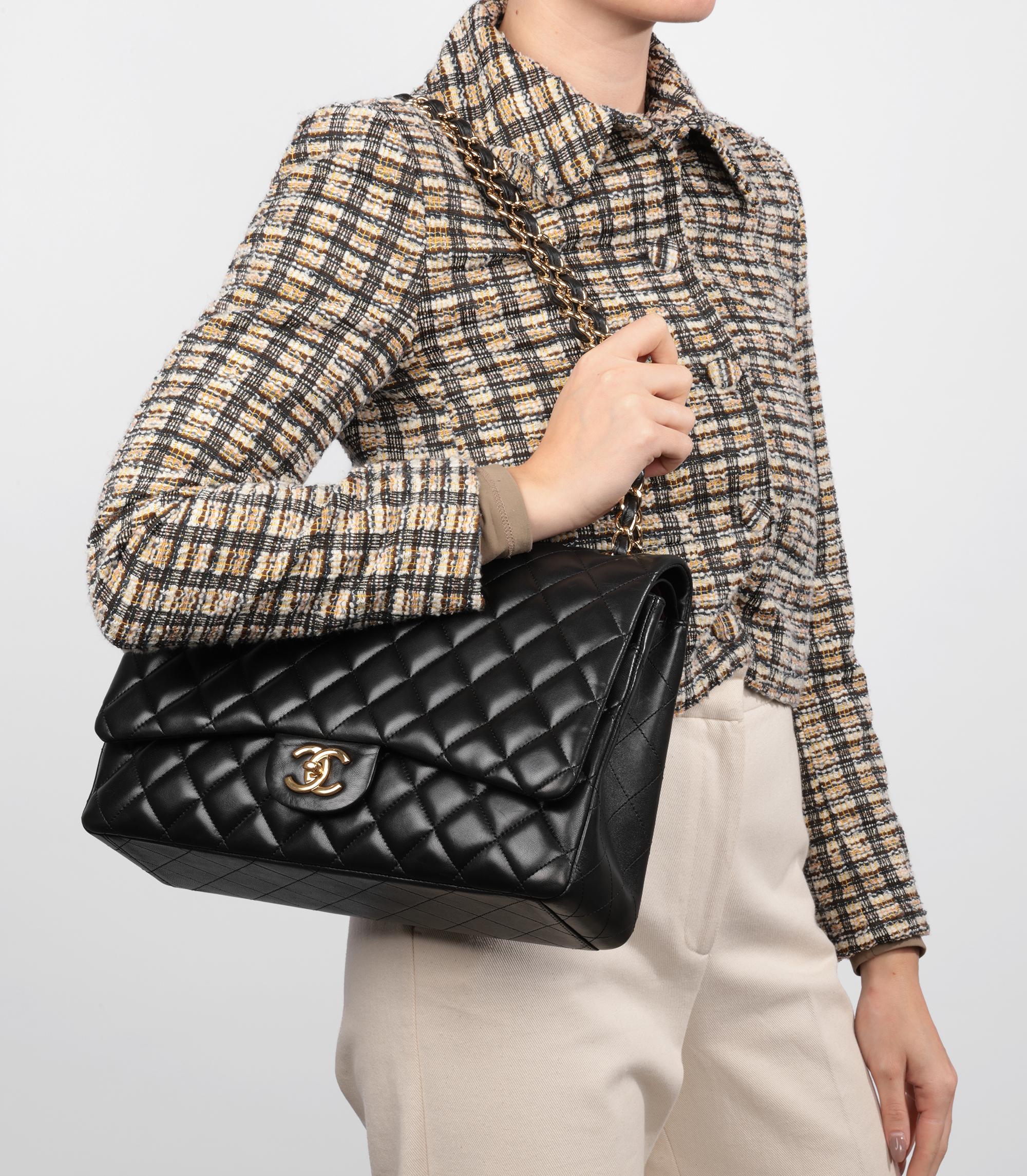 Chanel Black Quilted Lambskin Maxi Classic Double Flap Bag

Model- Maxi Classic Double Flap Bag
Product Type- Crossbody, Shoulder
Serial Number- 15******
Age- Circa 2011
Accompanied By- Chanel Dust Bag, Care Booklet, Authenticity Card, Protective