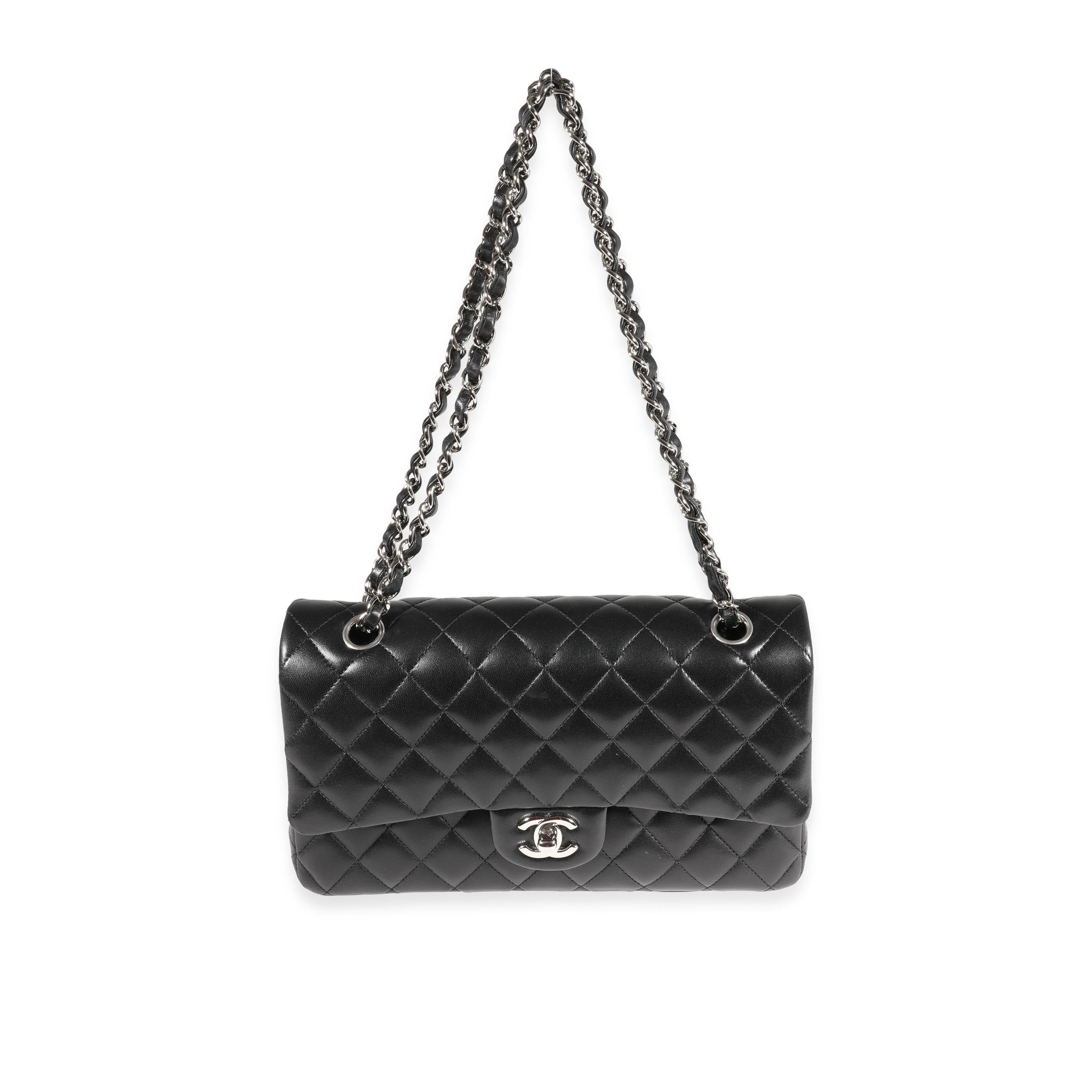 Listing Title: Chanel Black Quilted Lambskin Medium Classic Double Flap Bag
SKU: 121967
MSRP: 8800.00
Condition: Pre-owned 
Handbag Condition: Very Good
Condition Comments: Very Good Condition. Scuffing throughout exterior. Minor scratching at