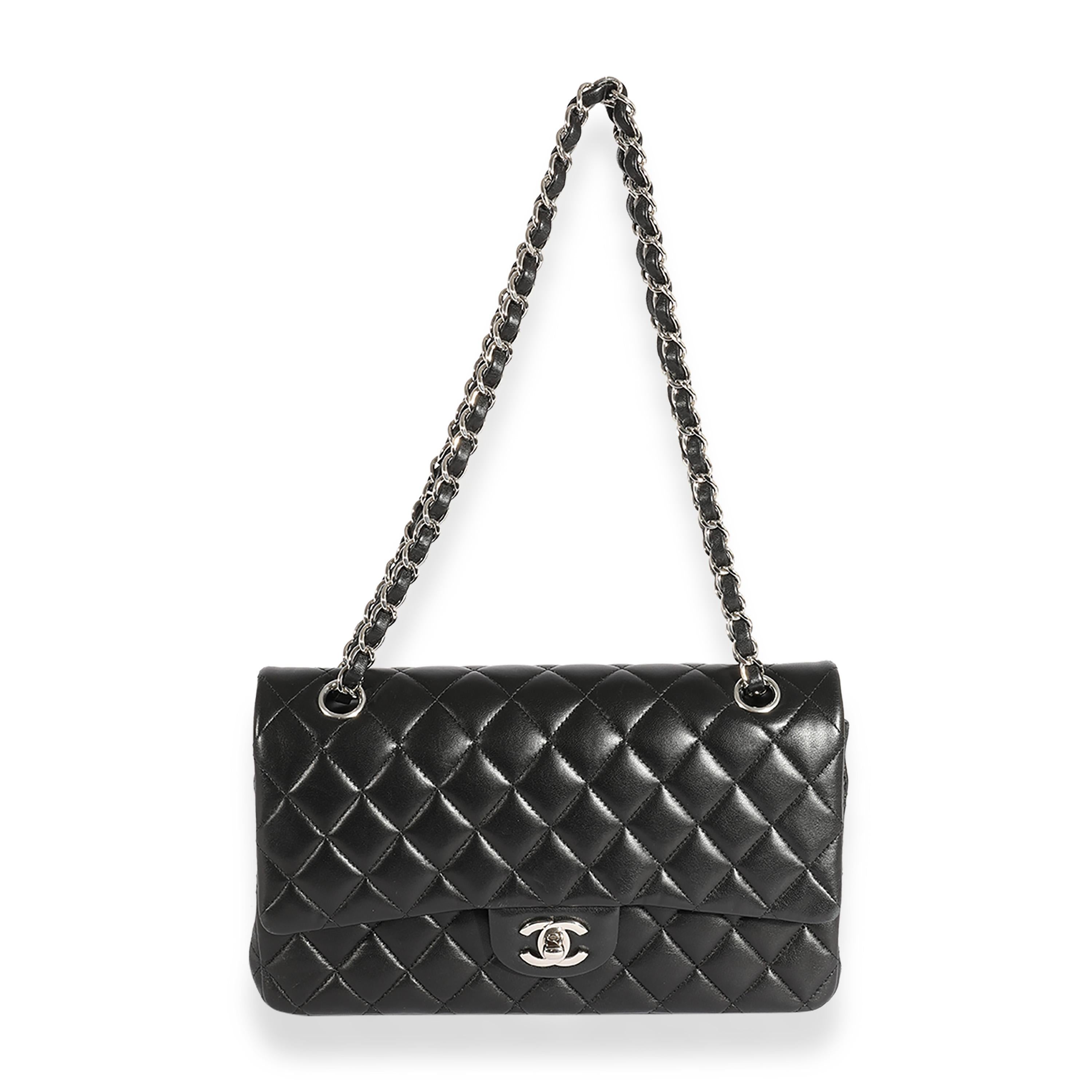 Listing Title: Chanel Black Quilted Lambskin Medium Classic Double Flap Bag
SKU: 123588
MSRP: 8800.00
Condition: Pre-owned 
Handbag Condition: Very Good
Condition Comments: Very Good Condition. Scuffing to corners and throughout exterior. Scratching