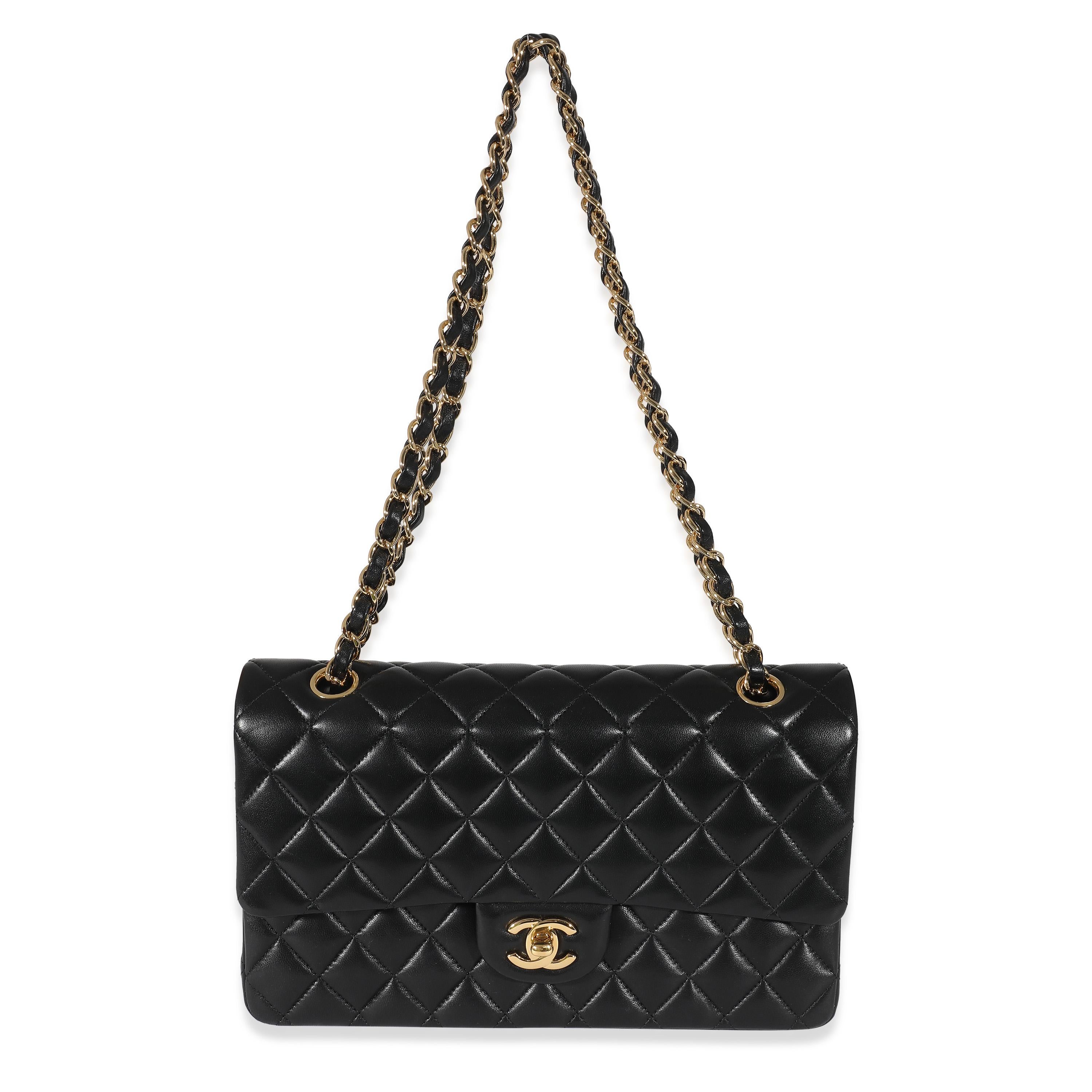 Listing Title: Chanel Black Quilted Lambskin Medium Classic Double Flap Bag
SKU: 134943
MSRP: 10200.00 USD
Condition: Pre-owned 
Handbag Condition: Very Good
Condition Comments: Item is in very good condition with minor signs of wear. Item is in