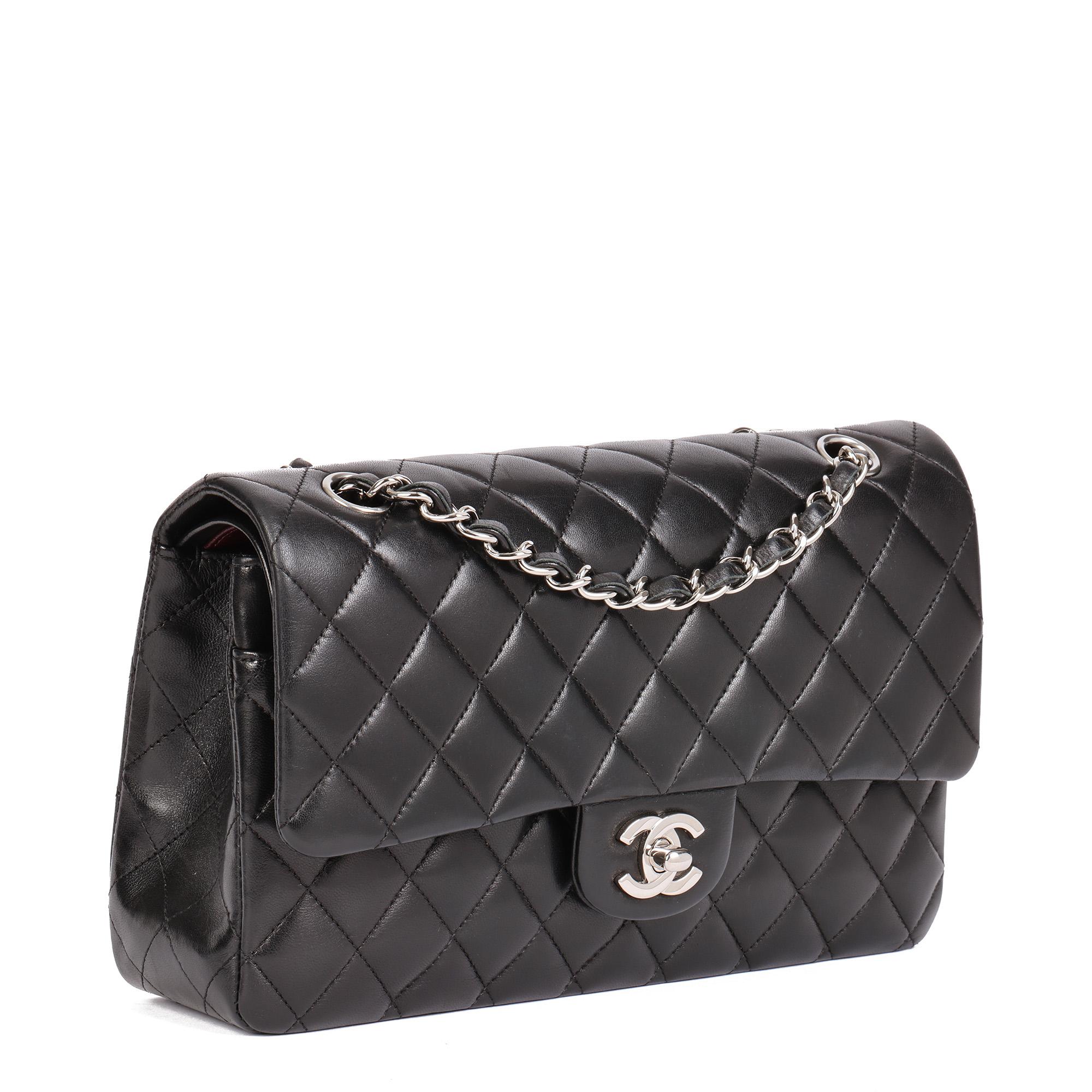 CHANEL
Black Quilted Lambskin Medium Classic Double Flap Bag

Xupes Reference: HB4776
Serial Number: 11479063
Age (Circa): 2006
Accompanied By: Chanel Dust Bag, Authenticity Card, Care Booklet, Chanel Ribbon
Authenticity Details: Authenticity Card,