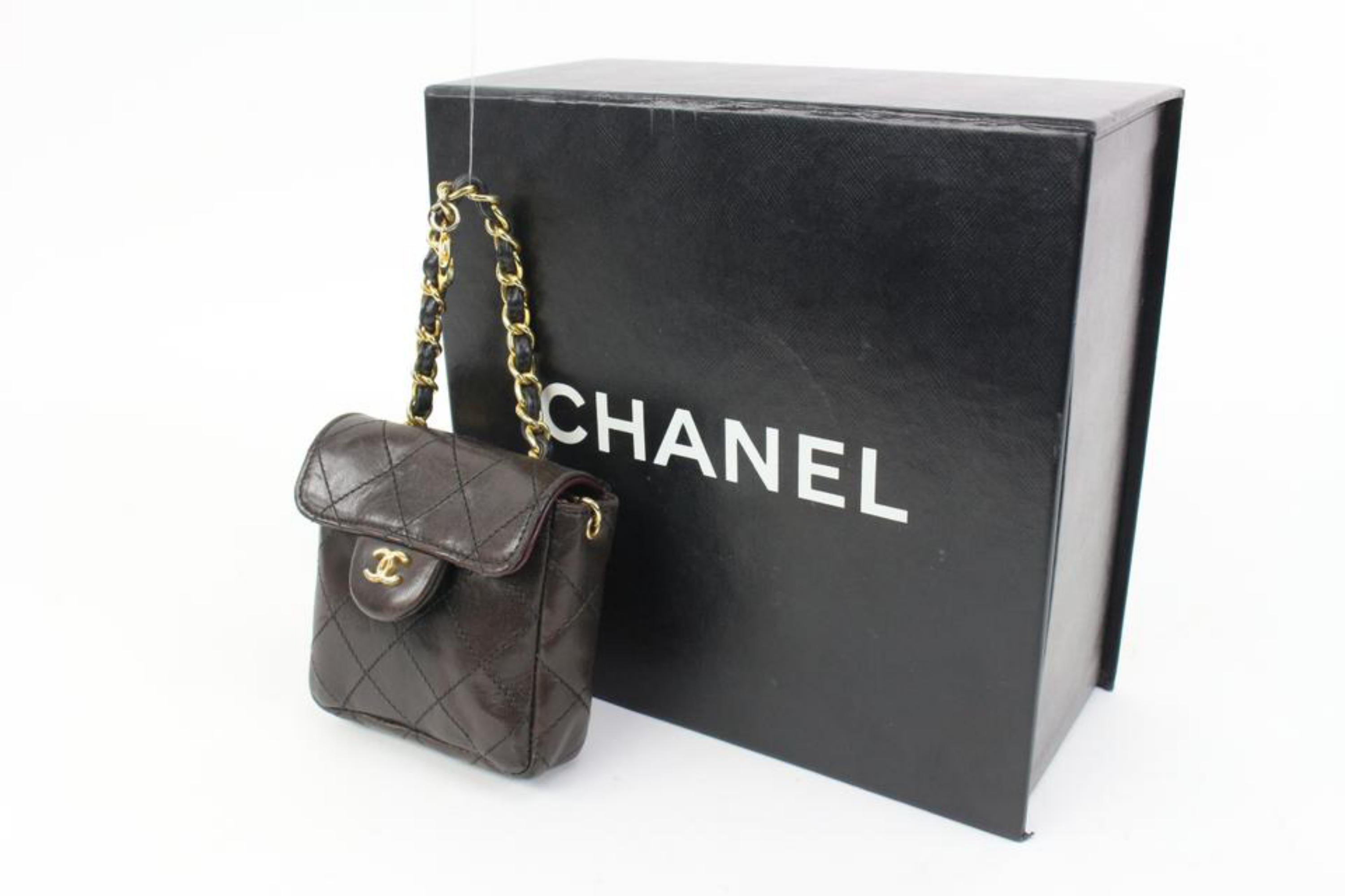 Chanel Black Quilted Lambskin Micro Classic Flap Mini Bag 50ck325s
Made In: France
Measurements: Length:  3