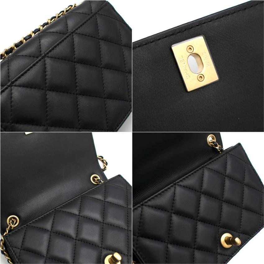 Chanel black quilted lambskin small classic full flap bag, being crafted from quilted lambskin it gives the owner a variety of styling options fitting the everyday essentials. It has the iconic CC logo and twist opening. The bag features two
