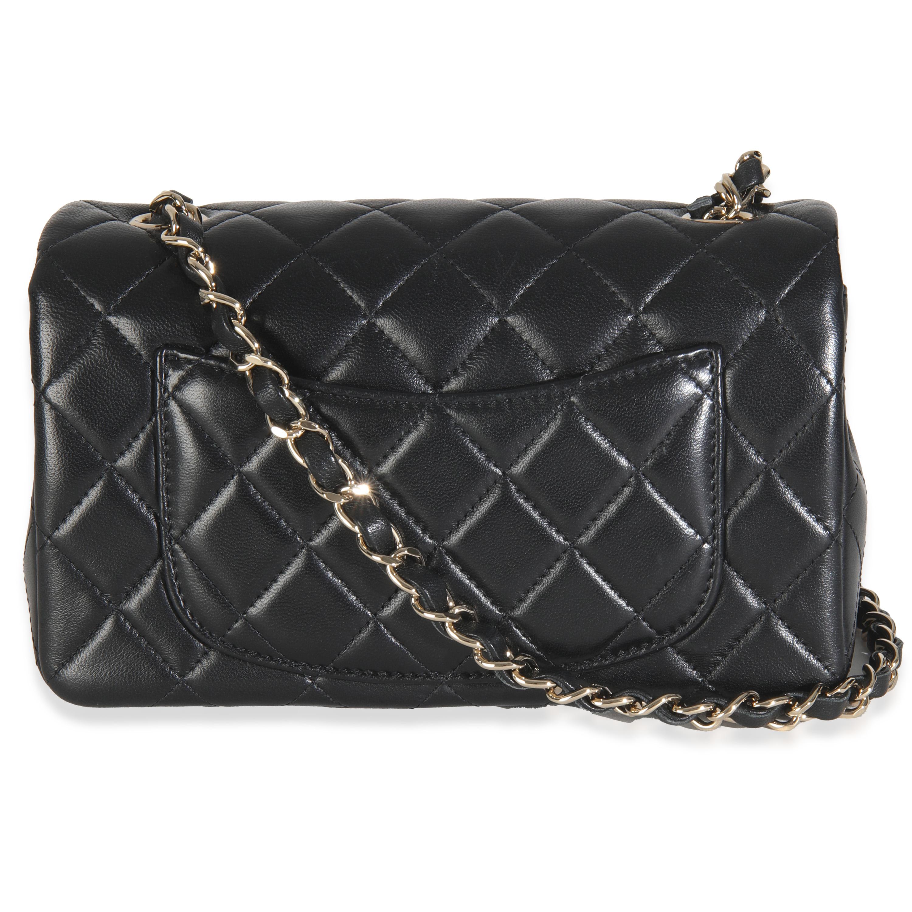 Listing Title: Chanel Black Quilted Lambskin Mini Rectangular Flap Bag
SKU: 145890
Condition: Pre-owned 
Condition Description: A timeless classic that never goes out of style, the flap bag from Chanel dates back to 1955 and has seen a number of