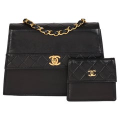 CHANEL Black Quilted Lambskin Mini Trapeze Classic Single Flap Bag with Pouch