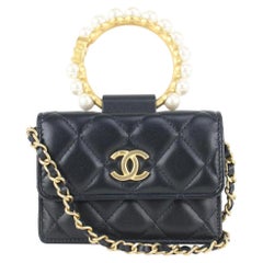 Chanel Bracelet de perles en cuir d'agneau matelassé noir  Mini sac à rabat chaîne 923ca99