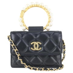 Chanel Schwarzes gestepptes Lammfell Perlenarmband Mini Chain Flap 923ca99