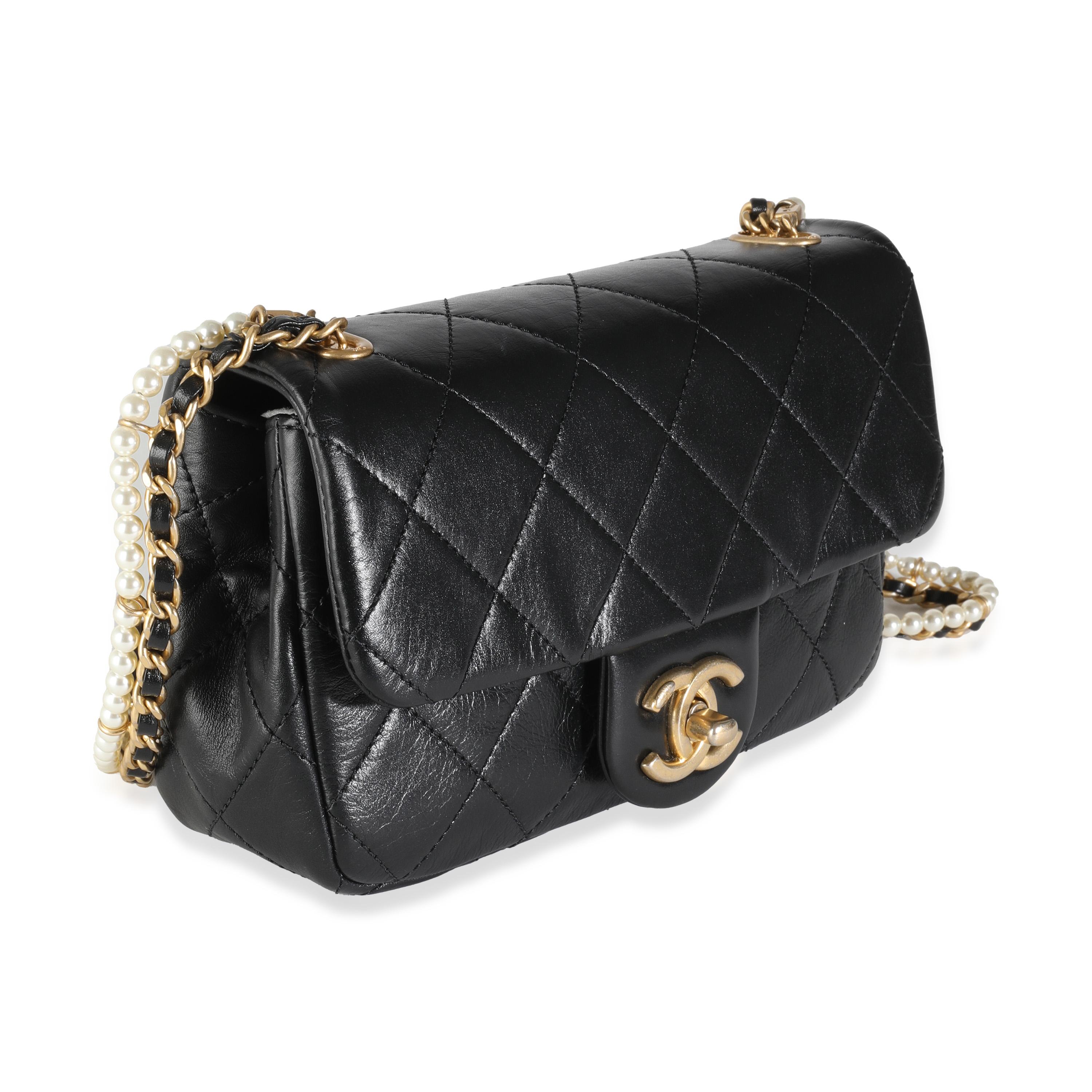 Chanel Black Quilted Lambskin Pearl Chain Mini Flap Bag In Excellent Condition For Sale In New York, NY