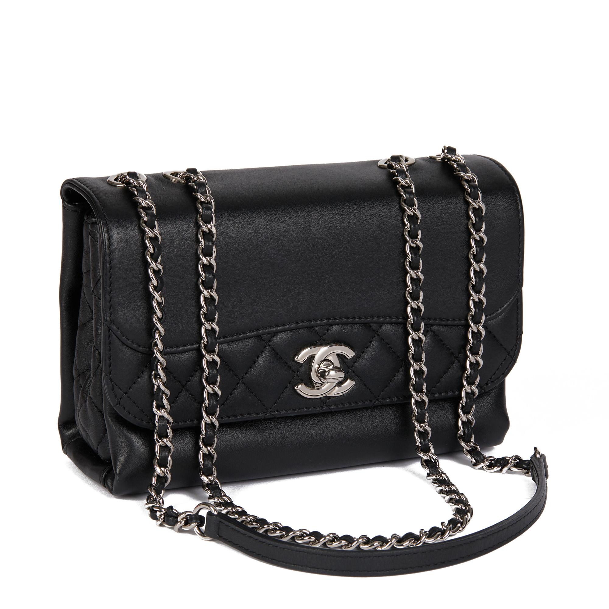 CHANEL
Black Quilted Lambskin Reverso Mini Tramezzo Flap Bag

Serial Number: 22283451
Age (Circa): 2016
Accompanied By: Chanel Dust Bag
Authenticity Details: Serial Sticker (Made in Italy) 
Gender: Ladies
Type: Shoulder, Crossbody

Colour: