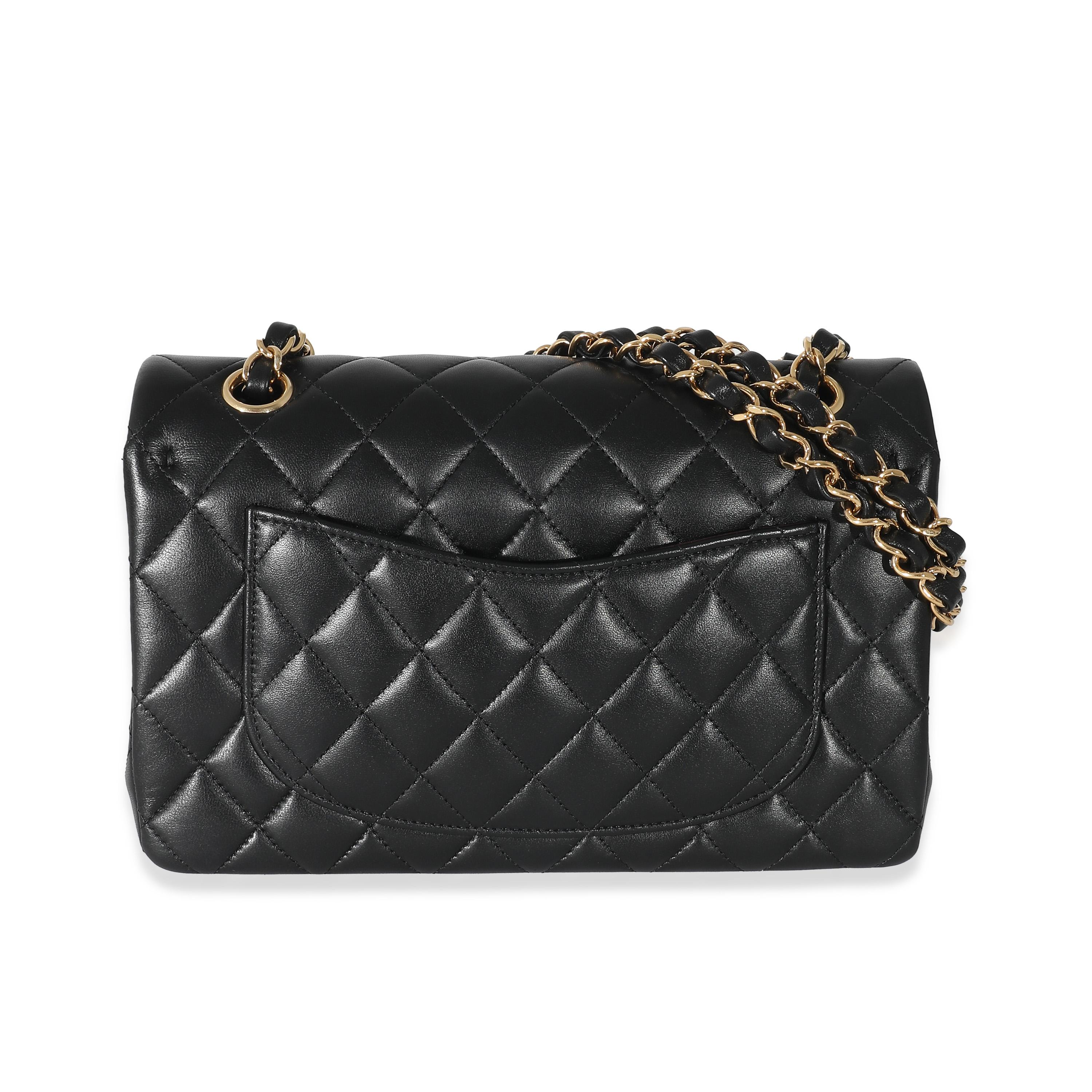 Listing Title: Chanel Black Quilted Lambskin Small Classic Double Flap Bag
SKU: 134175
MSRP: 9600.00 USD
Condition: Pre-owned 
Condition Description: A timeless classic that never goes out of style, the flap bag from Chanel dates back to 1955 and