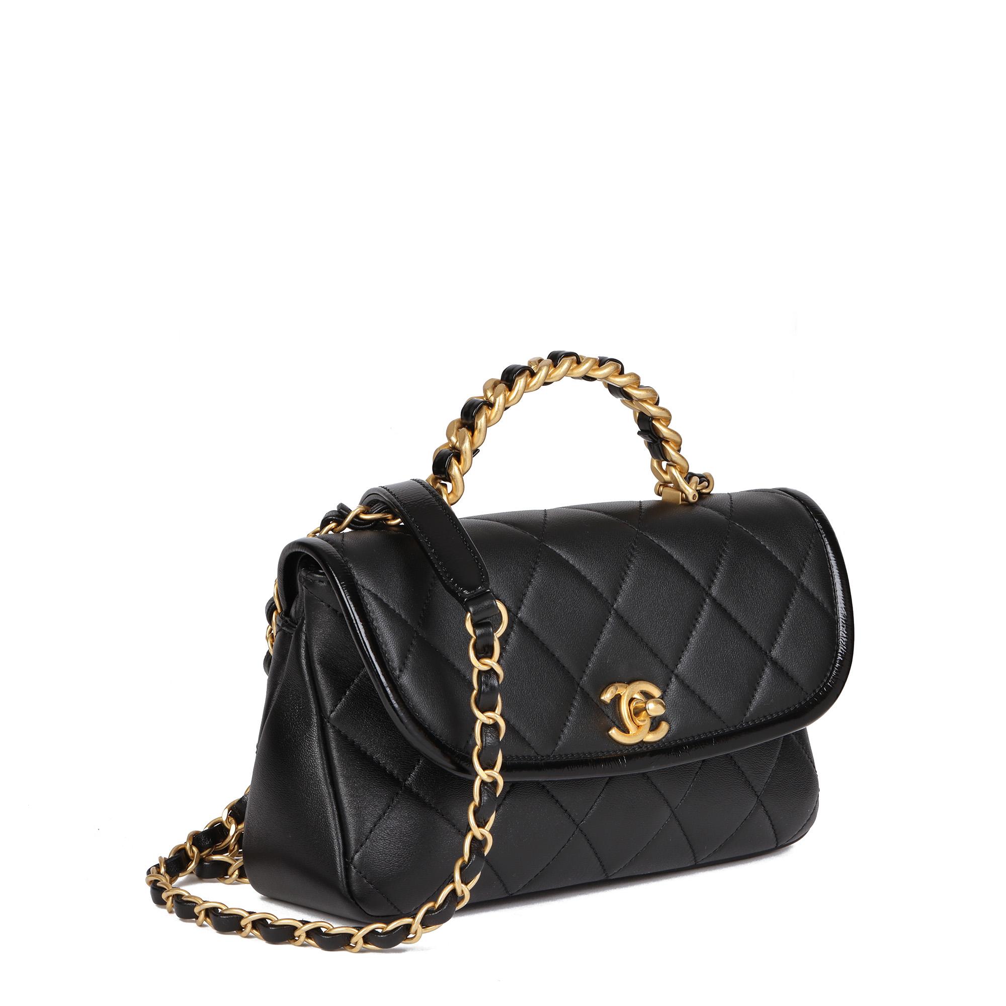 CHANEL
Black Quilted Lambskin Small Classic Top Handle Flap Bag

Xupes Reference: HB4548
Serial Number: 30991409
Age (Circa): 2020
Accompanied By: Chanel Dust Bag, Box, Authenticity Card, Care Booklet, Protective Felt
Authenticity Details: