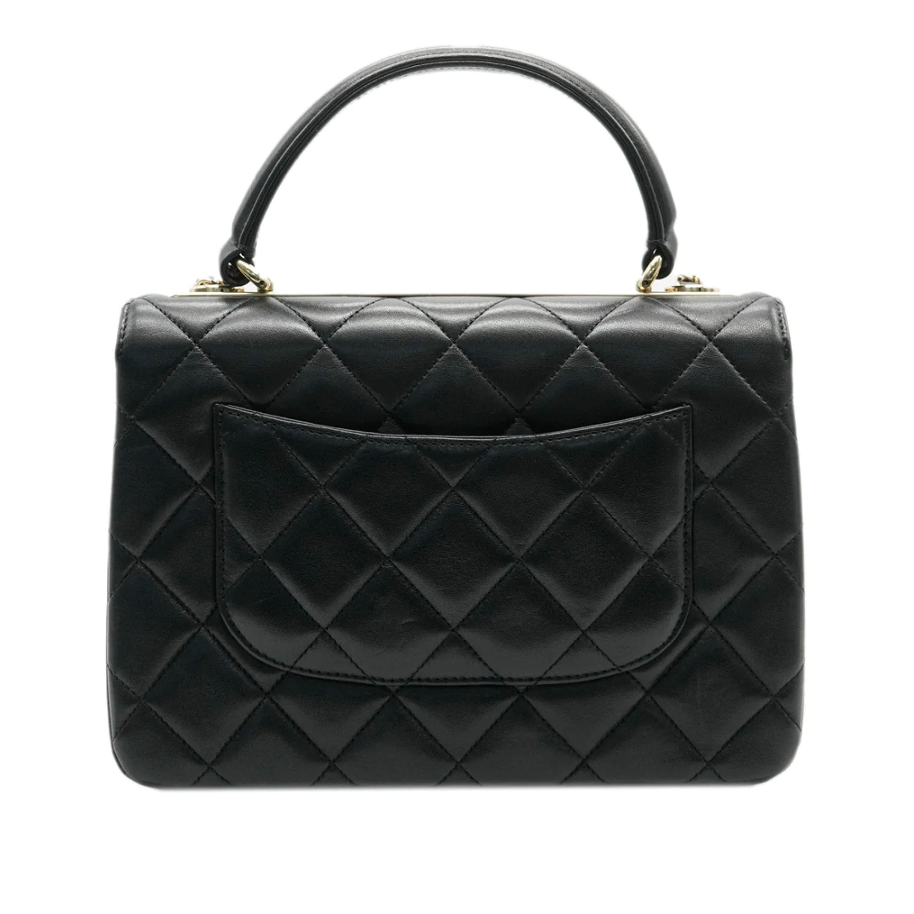 Listing Title: Chanel Black Lambskin Quilted Small Trendy Top Handle Bag
SKU: 138401
Condition: Pre-owned 
Handbag Condition: Very Good
Condition Comments: Item is in very good condition with minor signs of wear.  Scratches and wear to leather along