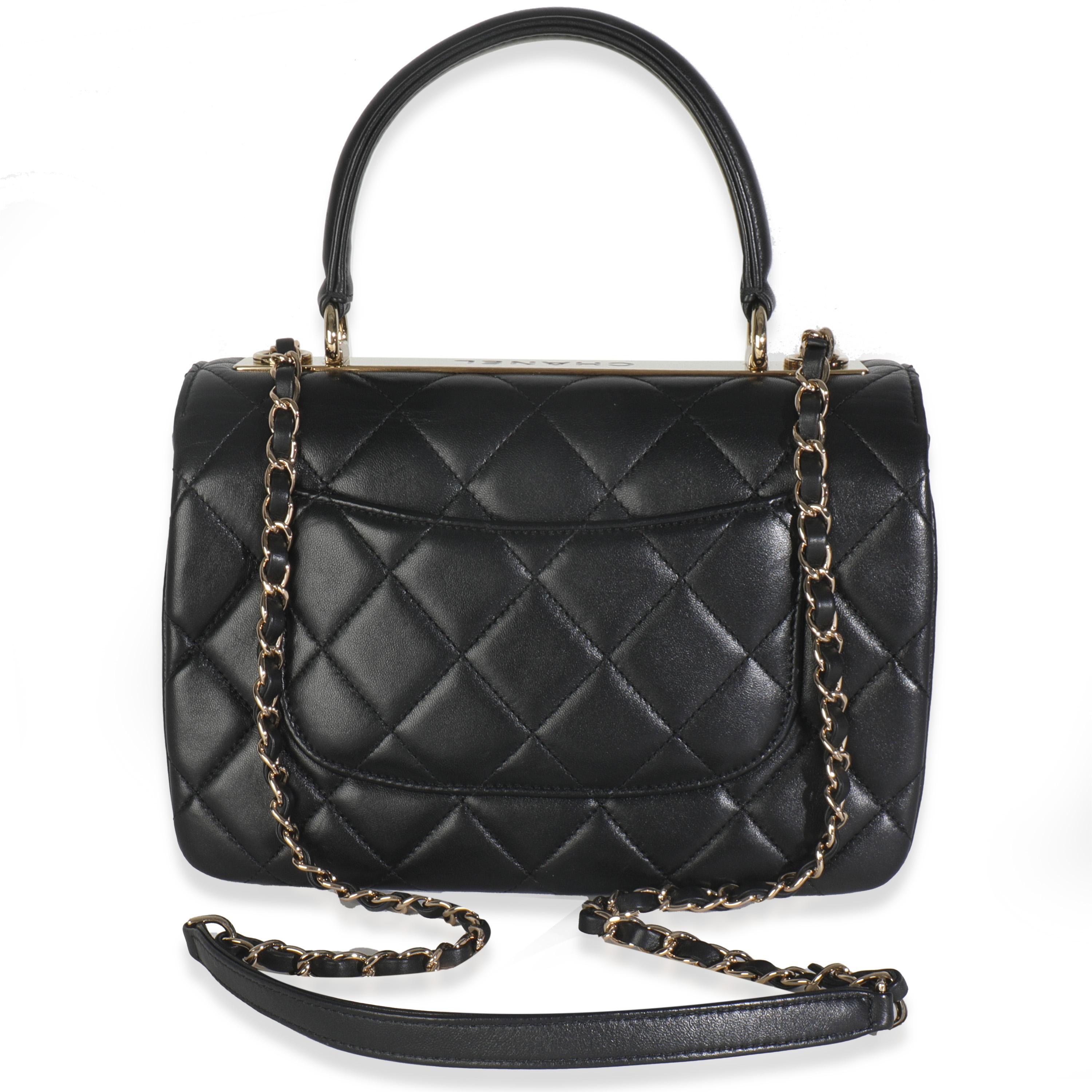 Listing Title: Chanel Black Quilted Lambskin Small Trendy CC Flap Dual Handle Bag
SKU: 148712
MSRP: 7100.00 USD
Condition: Pre-owned 
Condition Description: A timeless classic that never goes out of style, the flap bag from Chanel dates back to 1955