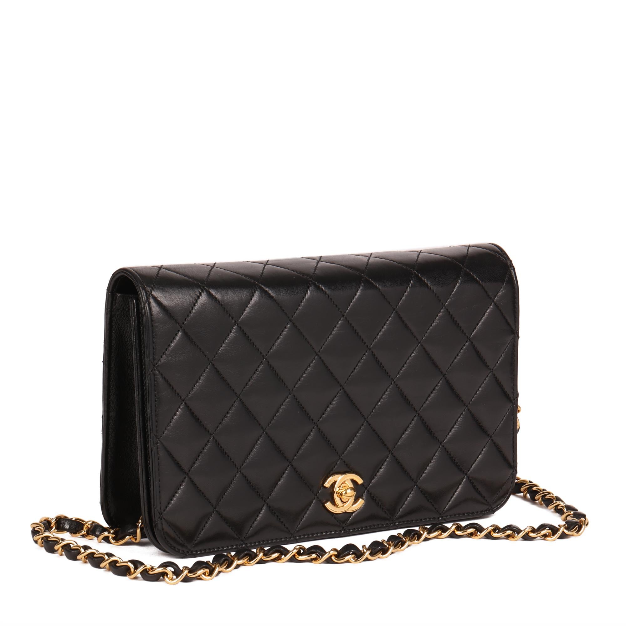 CHANEL
Black Quilted Lambskin Vintage Classic Single Full Flap Bag 

Serial Number: 11149255
Age (Circa): 2006
Accompanied By: Chanel Dust Bag, Authenticity Card 
Authenticity Details: Authenticity Card, Serial Sticker (Made in France)
Gender: