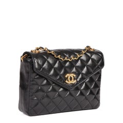 CHANEL Black Quilted Lambskin Vintage Crystal Embellished Mini Flap Bag