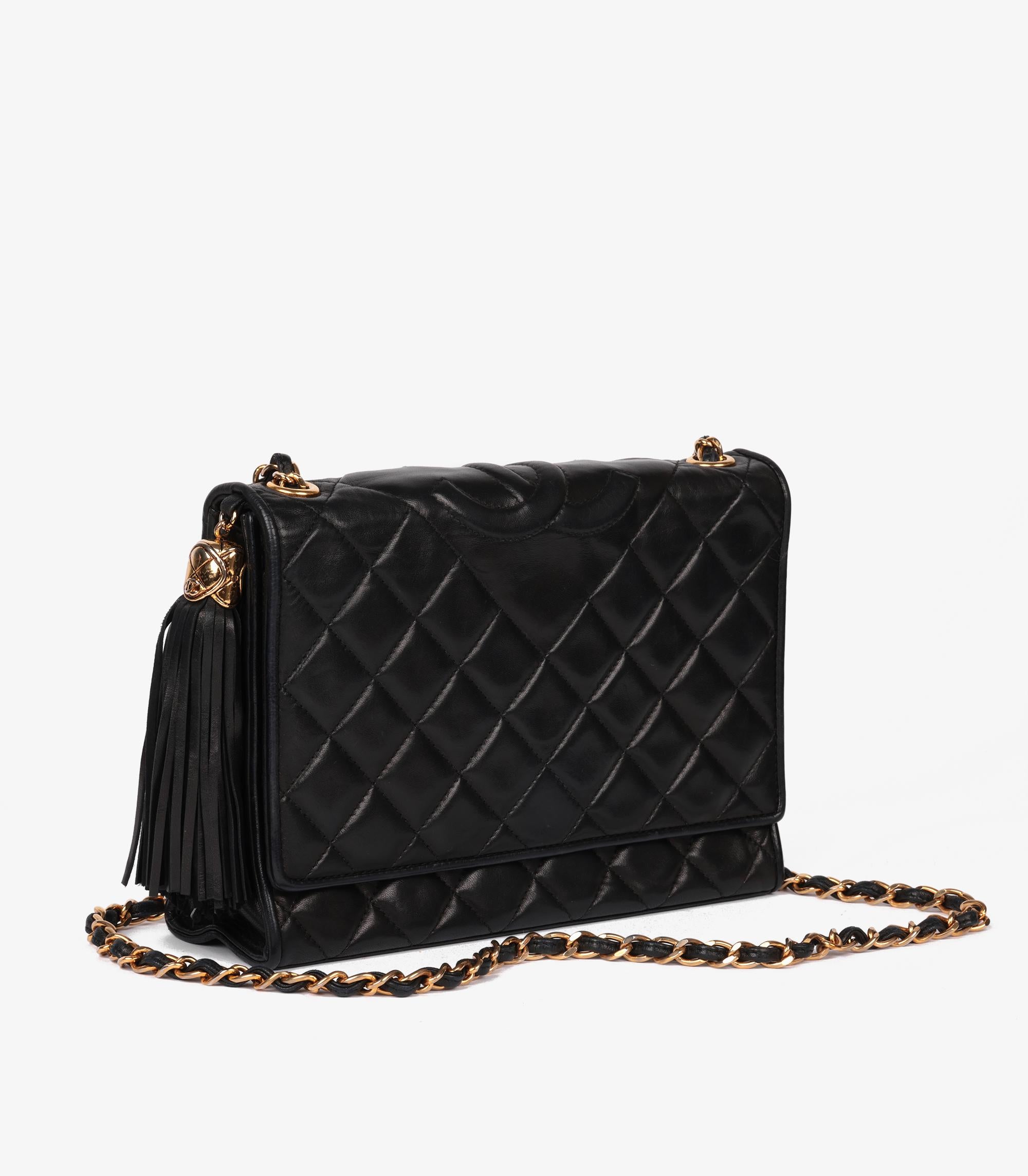 Brand- Chanel
Model- Small Fringe Timeless Single Flap Bag
Product Type- Shoulder
Serial Number- 15*****
Age- Circa 1989
Accompanied By- Authenticity Card
Colour- Black
Hardware- Gold
Material(s)- Lambskin Leather

Condition