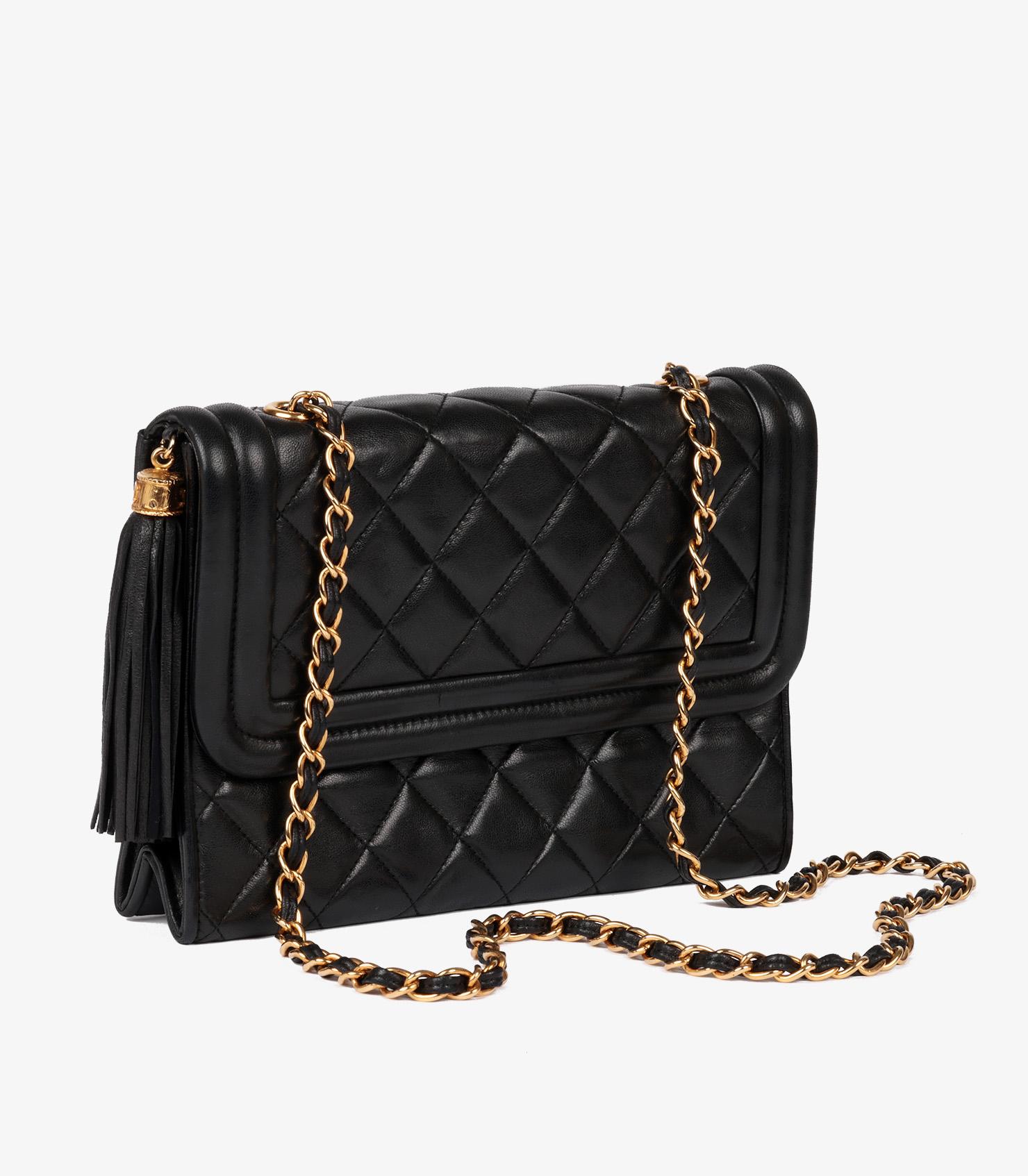 Chanel Black Quilted Lambskin Vintage Fringe Small Timeless Single Flap Bag

Brand- Chanel
Model- Small Fringe Timeless Single Flap Bag
Product Type- Shoulder
Serial Number- 10*****
Age- Circa 1989
Accompanied By- Chanel Dust Bag, Authenticity