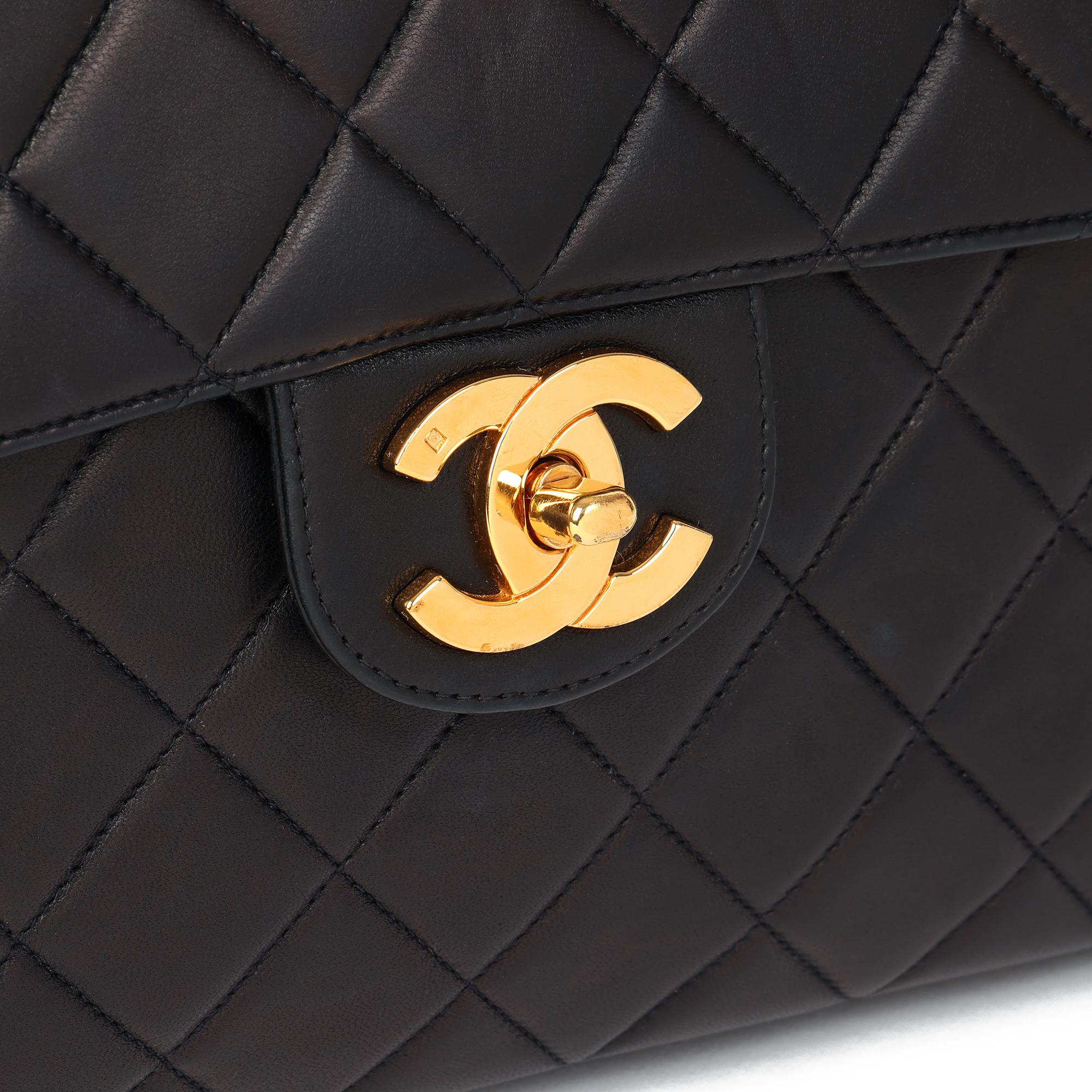 CHANEL
Black Quilted Lambskin Vintage Jumbo XL Classic Single Flap Bag

Xupes Reference: HB4008
Serial Number: 3969077
Age (Circa): 1996
Accompanied By: Chanel Dust Bag, Authenticity Card, Care Booklet, Protective Felt
Authenticity Details: