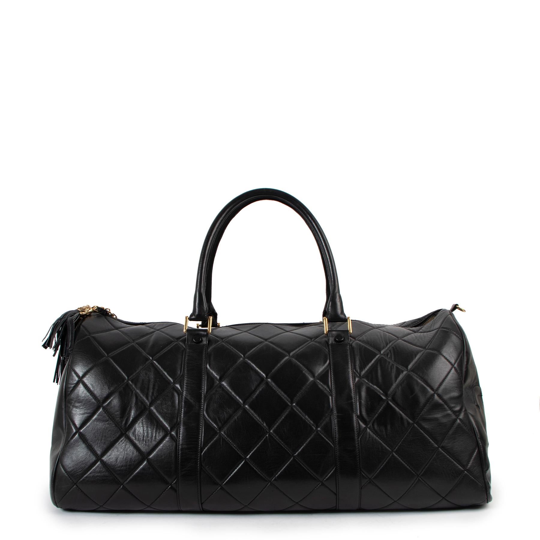 Chanel Black Quilted Lambskin Vintage Large Boston Travel Bag

This Chanel Vintage Large Duffle Bag is a travel must-have. Made from ultra-soft lambskin in the iconic diamond quilting. The bag features stitched CC logo on both sides. The double