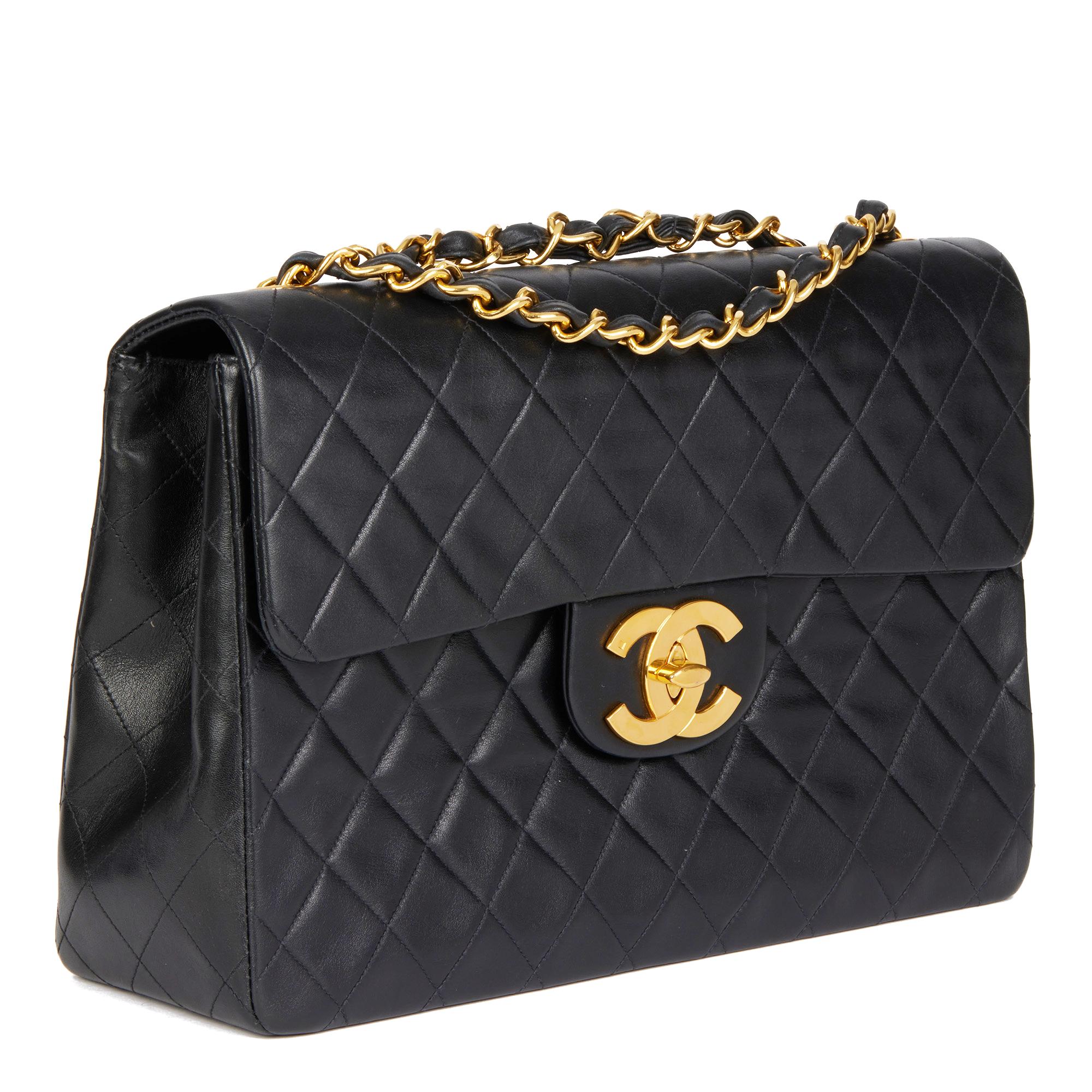 CHANEL
Black Quilted  Lambskin Vintage Maxi Jumbo XL Classic Single Flap Bag

Xupes Reference: HB4689
Serial Number: 78205776
Age (Circa): 2003
Authenticity Details: Serial Sticker (Made in France)
Gender: Ladies
Type: Shoulder, Crossbody

Colour: