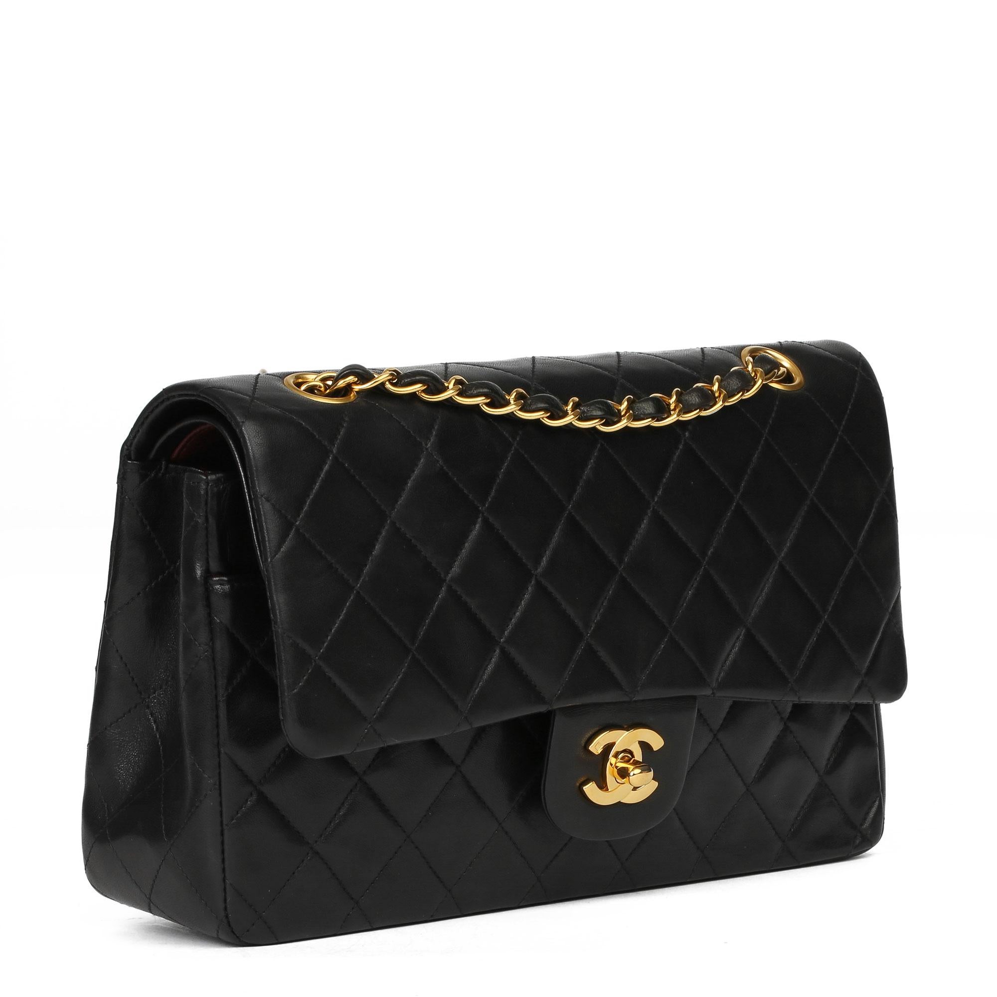 CHANEL
Black Quilted Lambskin Vintage Medium Classic Double Flap Bag

Xupes Reference: HB3937
Serial Number: 4567300
Age (Circa): 1997
Accompanied By: Chanel Dust Bag
Authenticity Details: Serial Sticker (Made in France)
Gender: Ladies
Type: