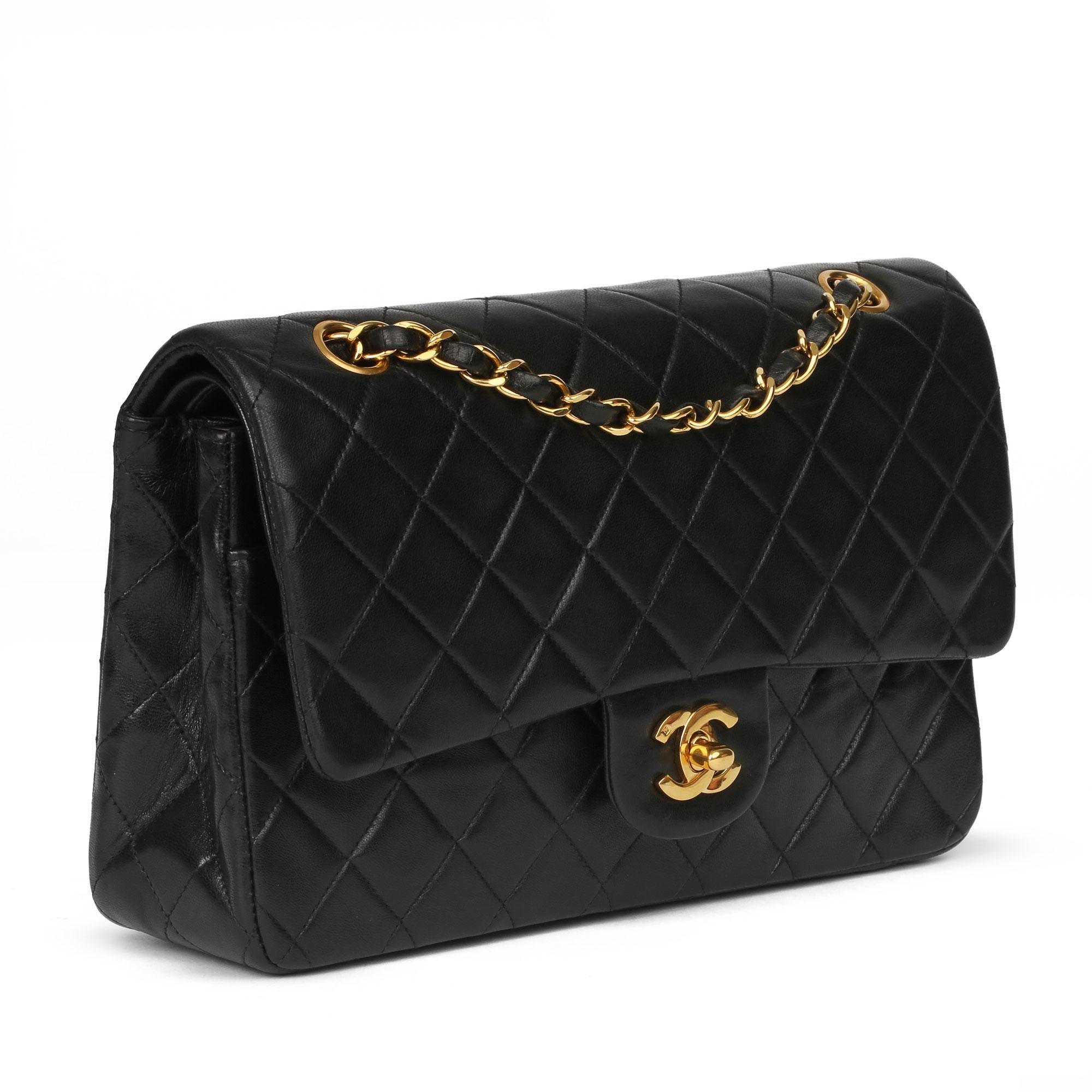 CHANEL
Black Quilted Lambskin Vintage Medium Classic Double Flap Bag

Xupes Reference: HB3939
Serial Number: 2457475
Age (Circa): 1994
Accompanied By: Chanel Dust Bag
Authenticity Details: Serial Sticker (Made in France) 
Gender: Ladies
Type: